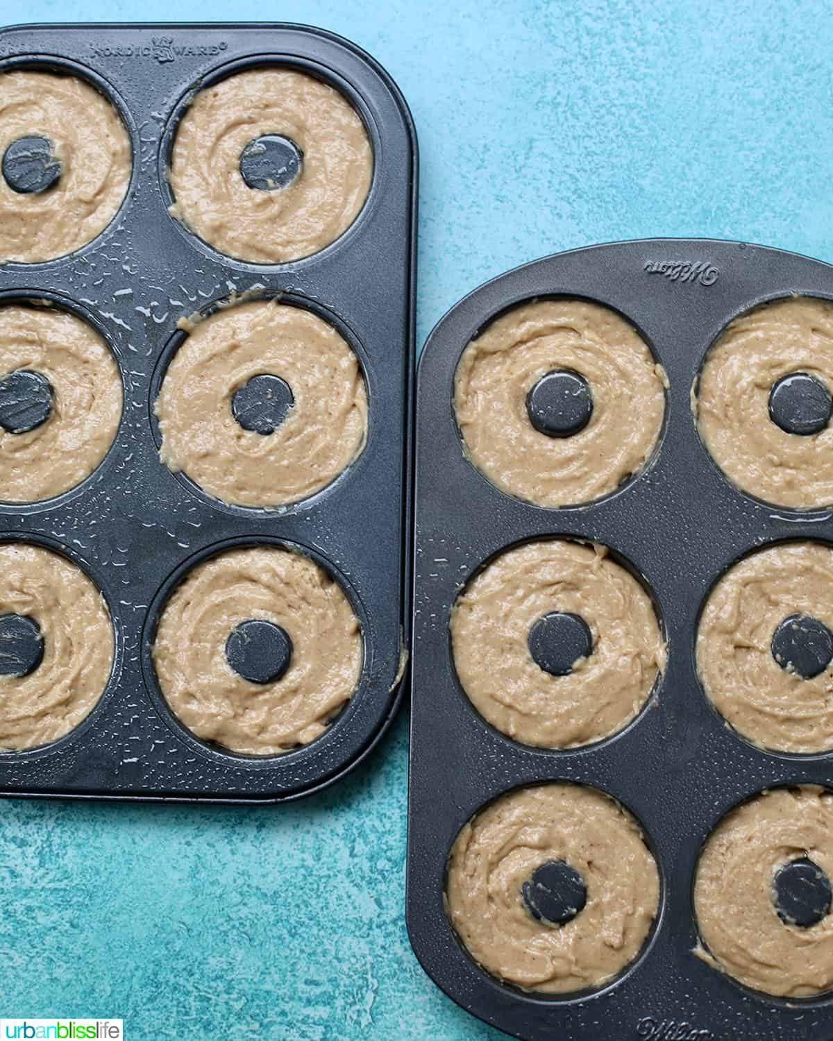 apple cinnamon donut batter in donut pans