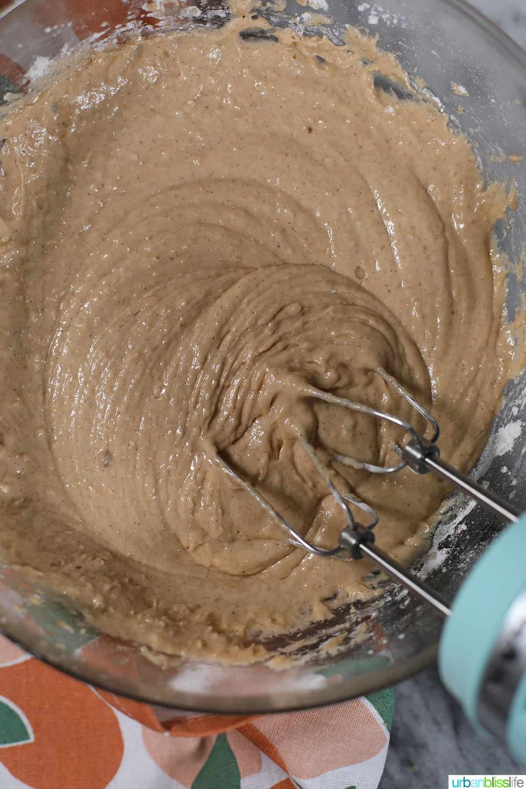 mixing batter for apple cinnamon donuts