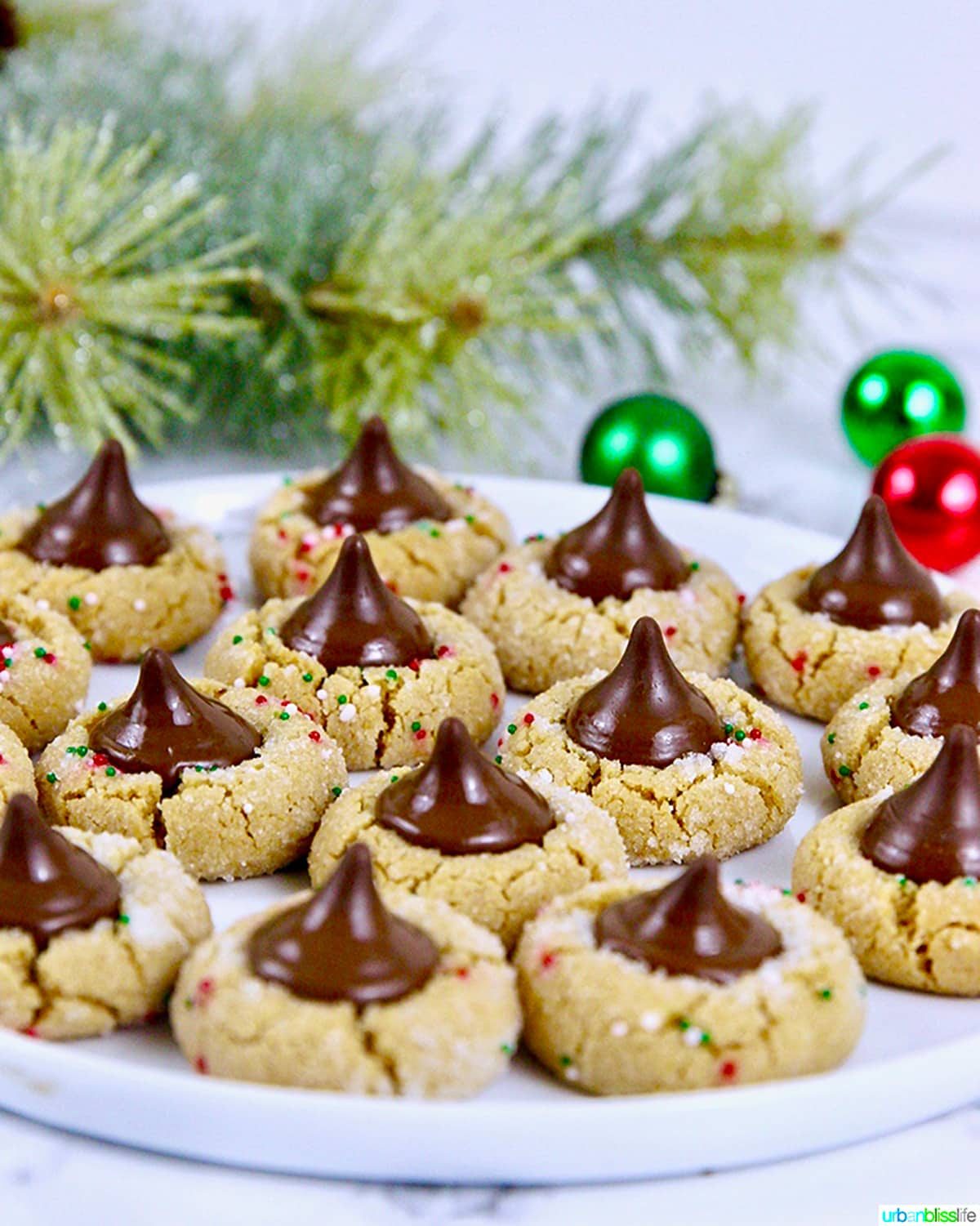 Peanut Butter Blossom Cookies with a holiday background