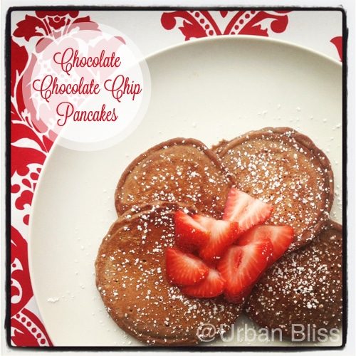 Chocolate chocolate chip pancakes are a decadent, tasty way to celebrate special mornings! Recipe on UrbanBlissLife.com