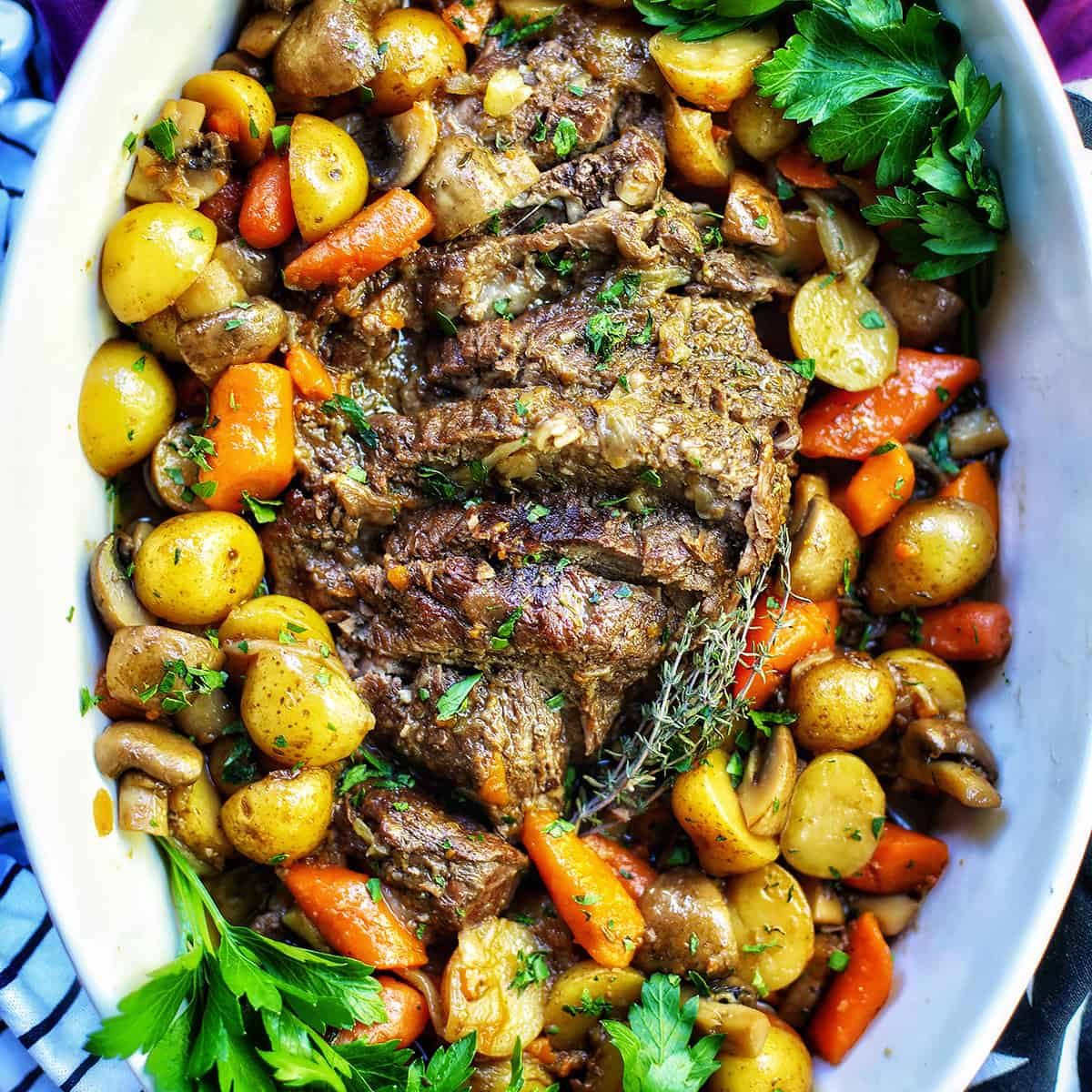 dutch oven pot roast with potatoes and carrots.