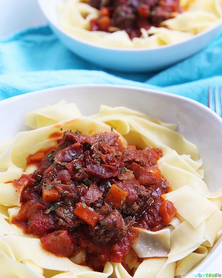 big bowls of Pressure-cooker Short Rib Ragu over pasta
