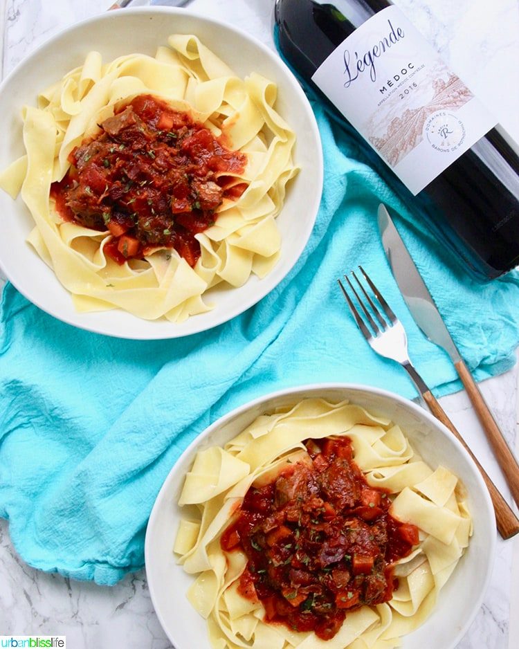 Pressure-cooker Short Rib Ragu with red wine bottle