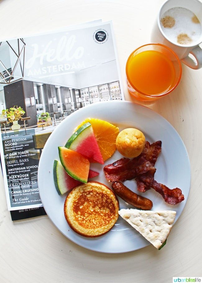 bacon, sausage and fruit breakfast at NH Carlton hotel in Amsterdam