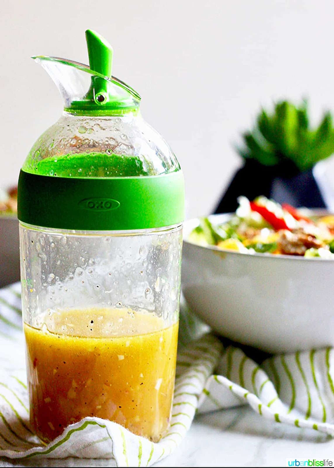 jar of honey orange dressing for salad.
