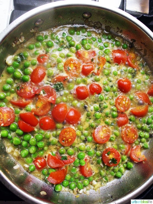 Wild Alaskan Halibut Poached with Tomatoes and Peas Wine Sauce, recipe on UrbanBlissLife.com