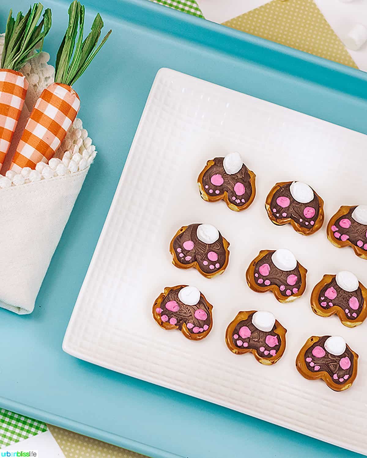 cute Easter bunny pretzels on blue tray