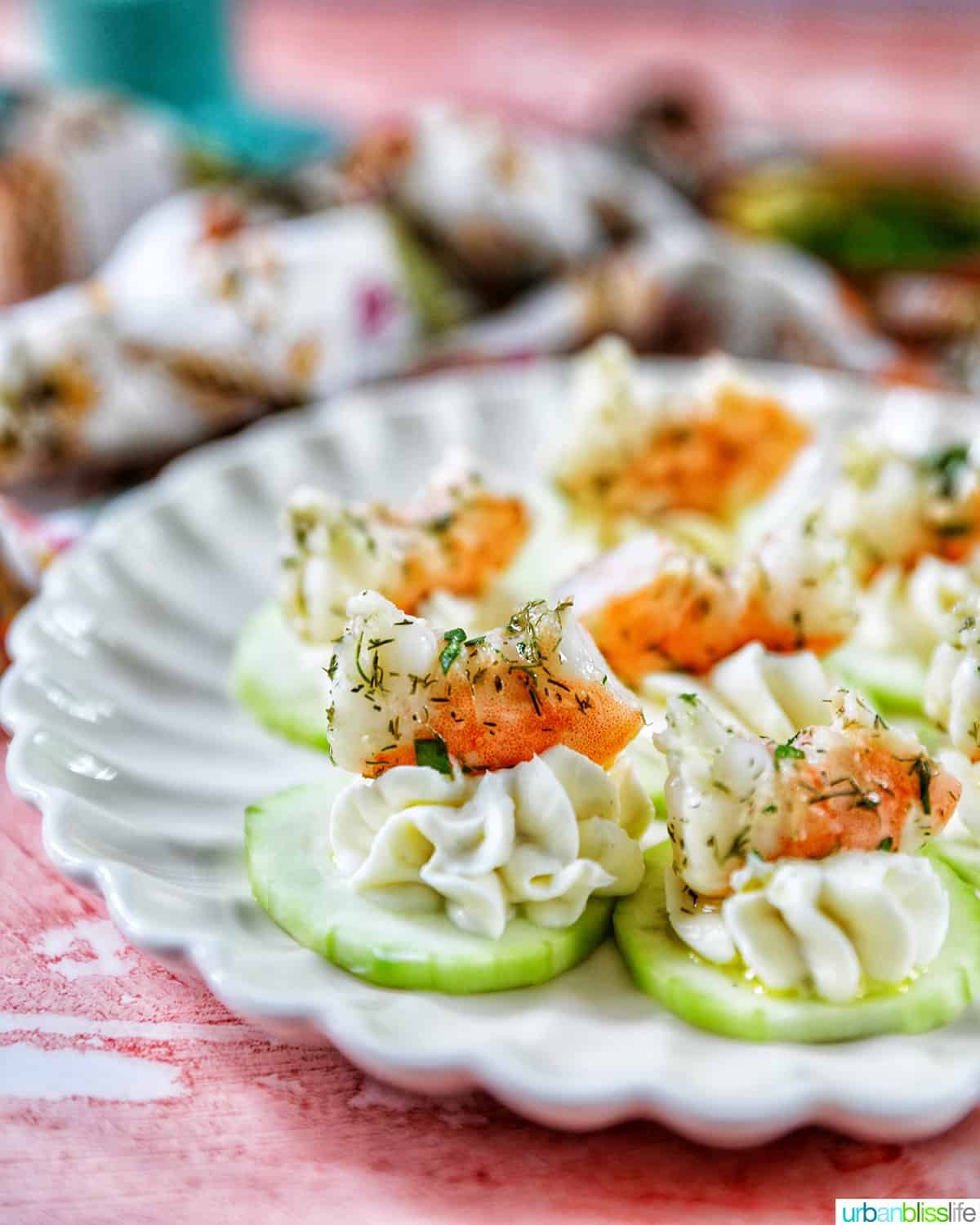 shrimp canapes on a white plate.