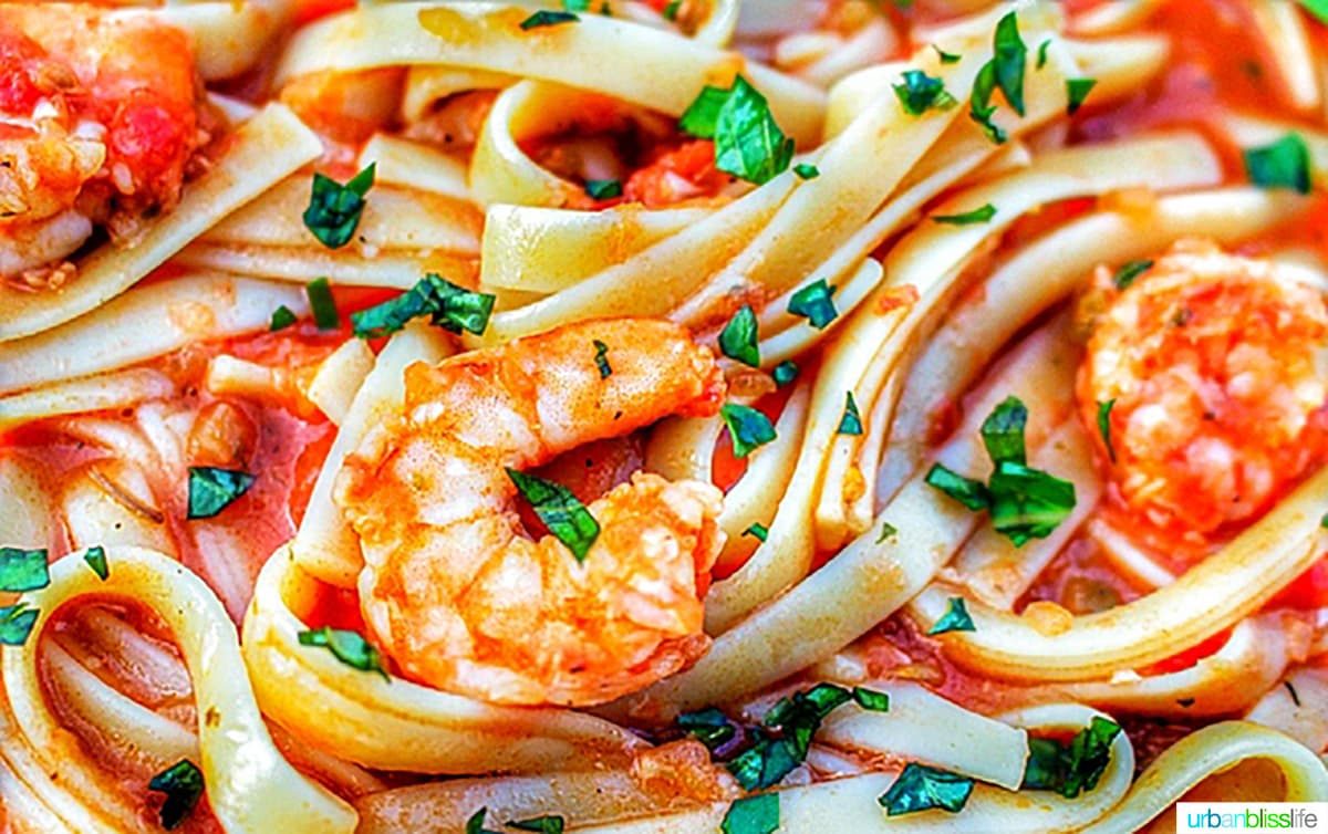 closeup photo of shrimp fettuccine with vodka sauce