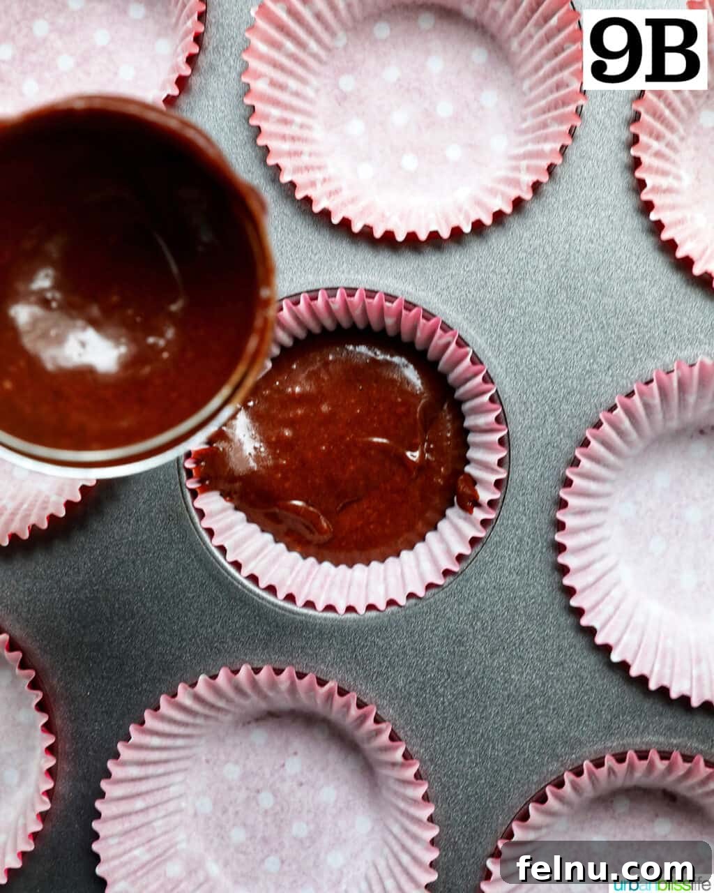 Velvet Chocolate Fudge Cupcakes 16 pouring chocolate cupcake batter into prepared cupcake liners.
