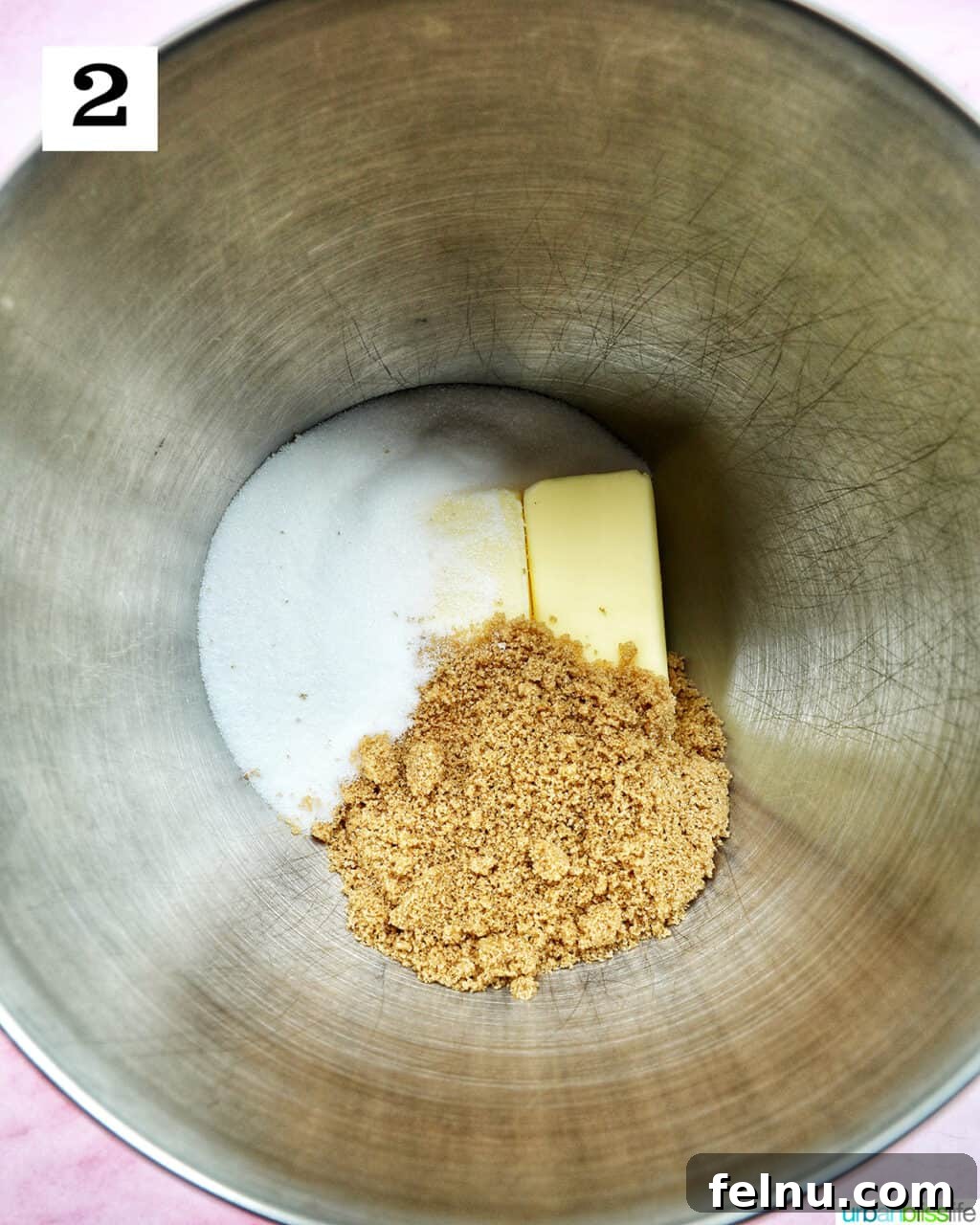 Love Struck Cookie Cake 8 butter and two sugars in a stand mixer bowl.