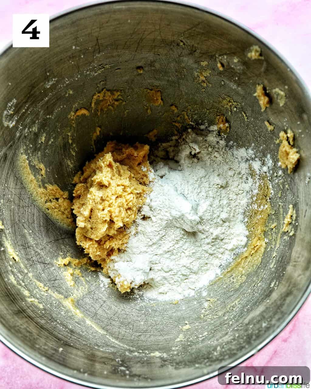 Love Struck Cookie Cake 10 cookie batter with flour mixture added in a stand mixer bowl.