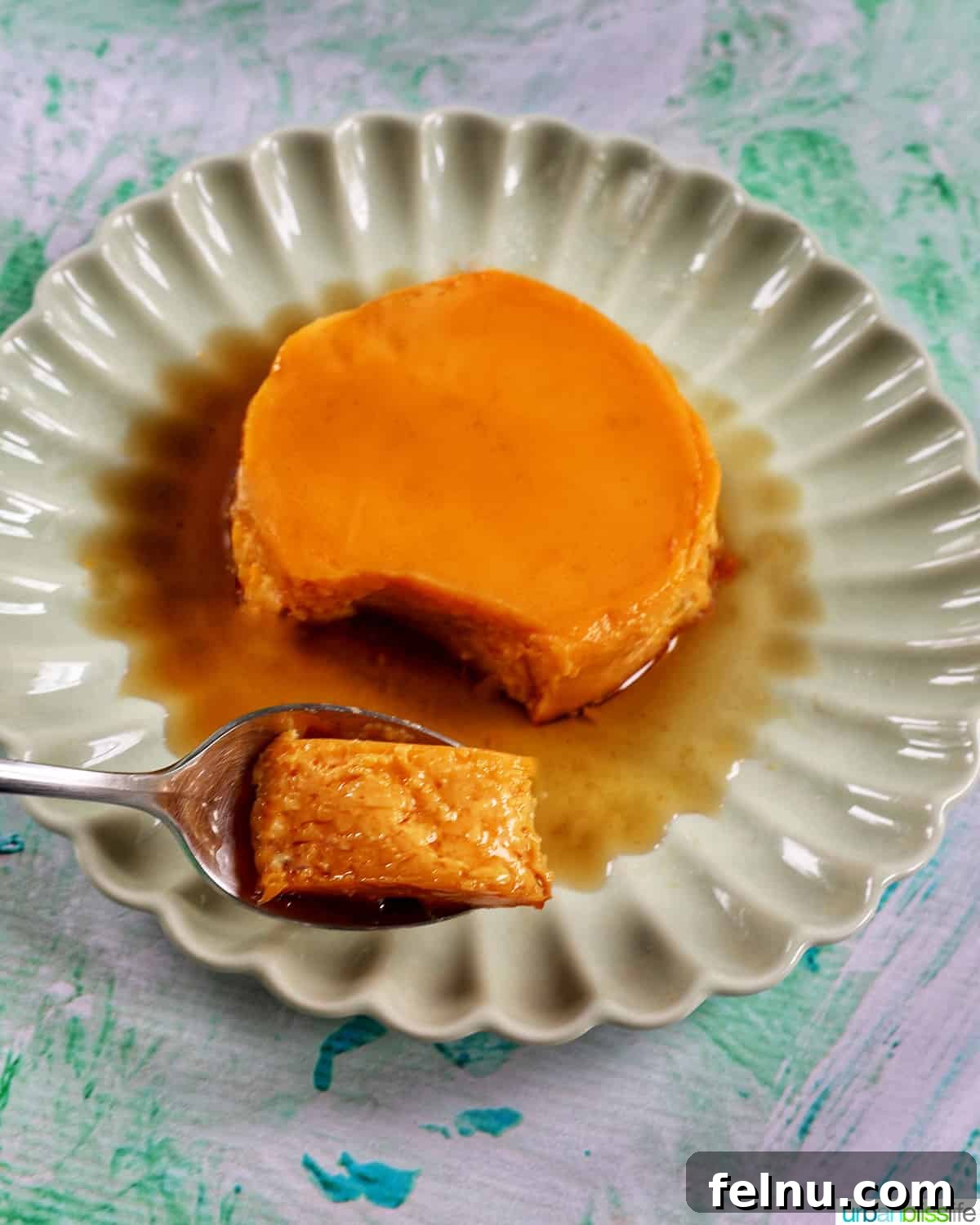 Over 30 Delectable Asian Dessert Ideas 3 A spoonful of Filipino Leche Flan with rich caramel sauce.