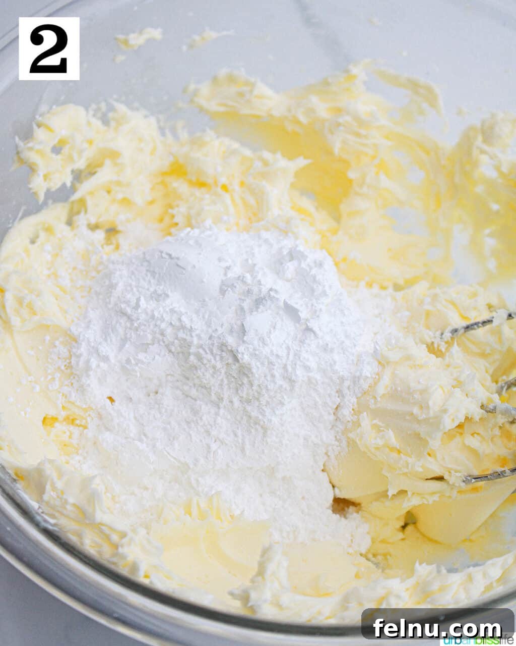 Lemon Basil Bliss Cupcakes 12 Adding Powdered Sugar to Buttercream