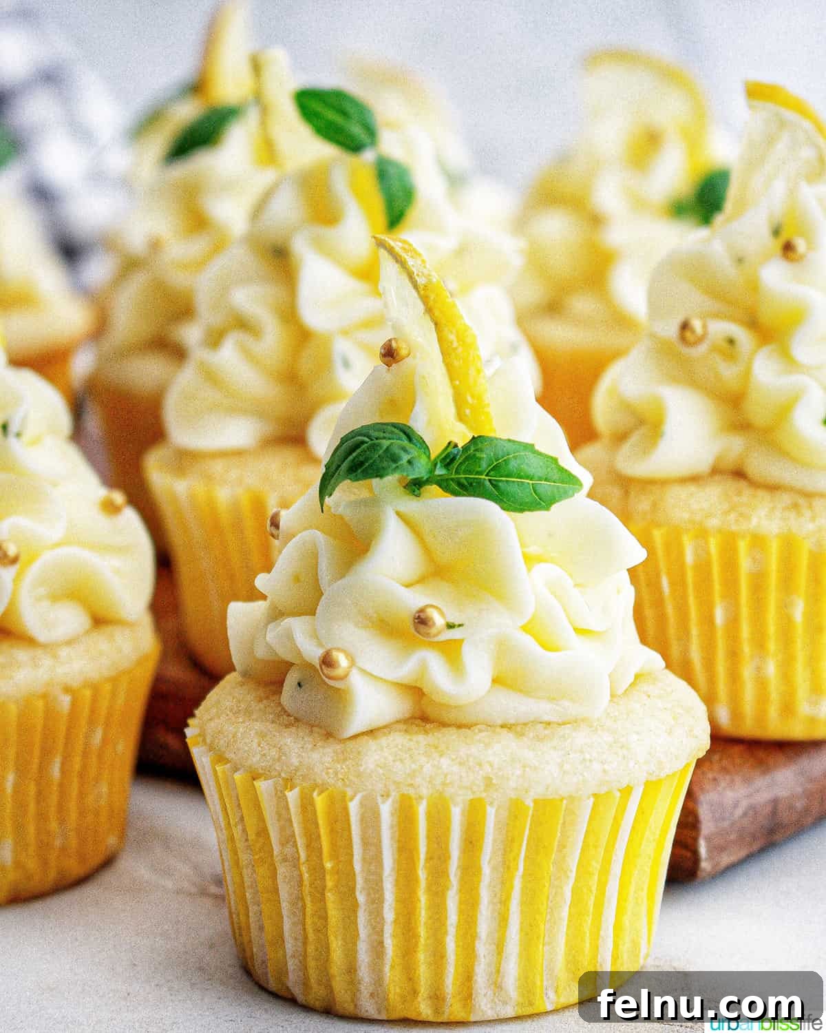 Lemon Basil Bliss Cupcakes 3 Lemon Basil Cupcakes with Basil Garnish