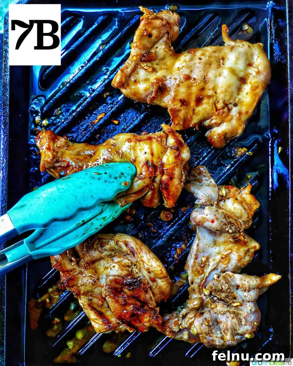 Thai Lemongrass Chicken
Delicious Thai Lemongrass Chicken Recipe 12 Chicken thighs cooking on a grill pan, with blue tongs nearby.