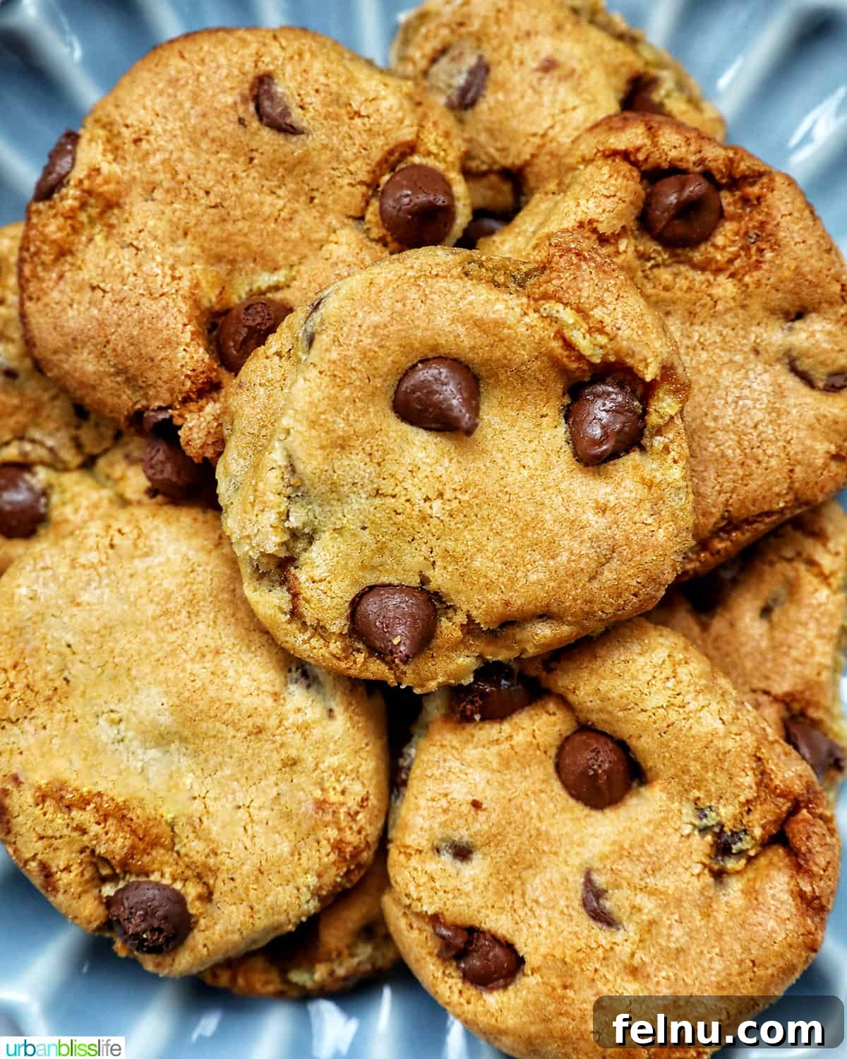 Crispy Air-Fried Delights 2 stack of air fryer chocolate chip cookies on a plate.