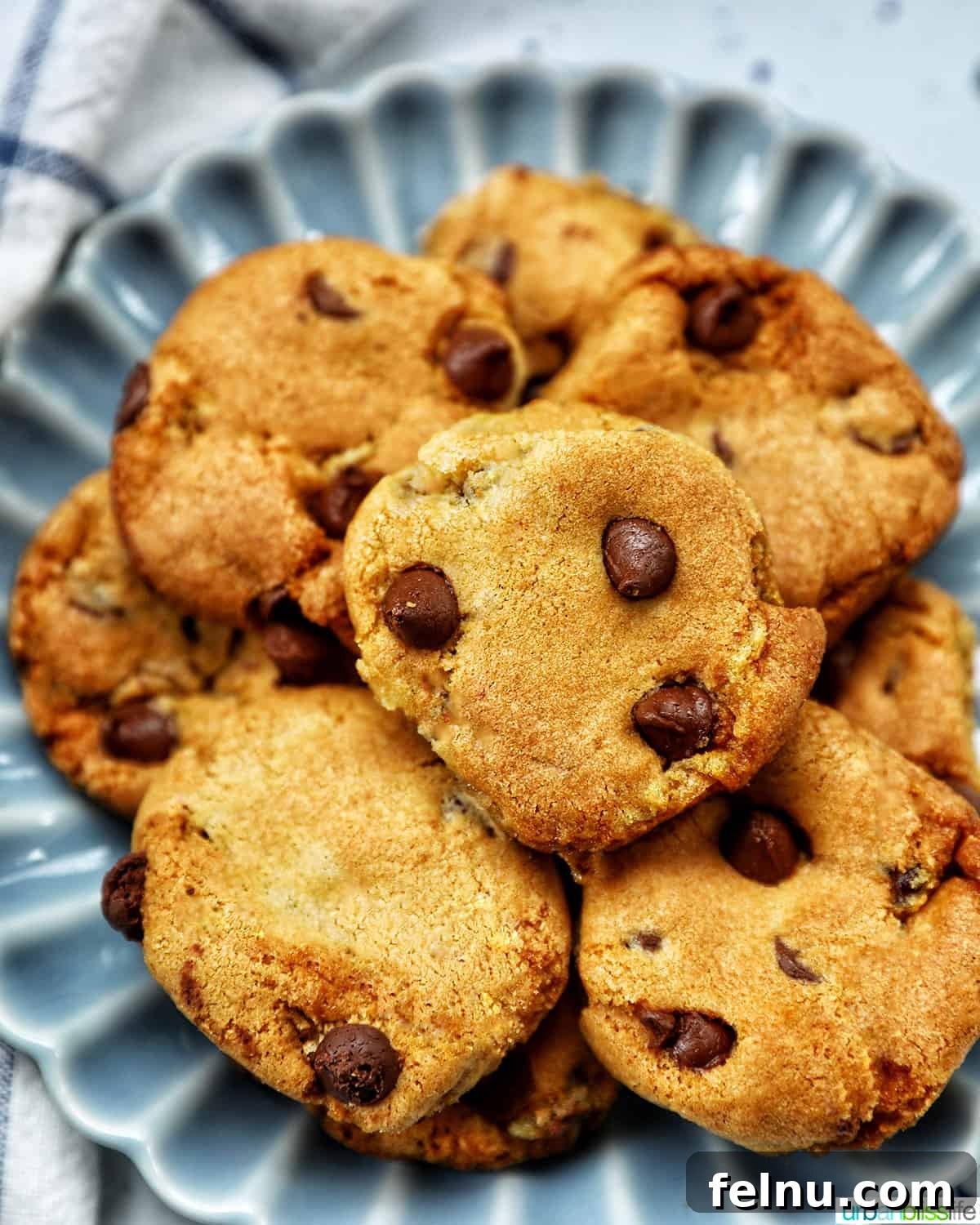 Crispy Air-Fried Delights 18 stack of air fryer chocolate chip cookies on a plate.