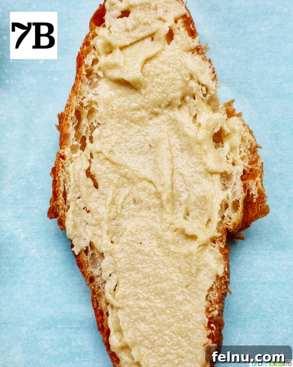 The frangipane filling generously applied to the almond croissants.