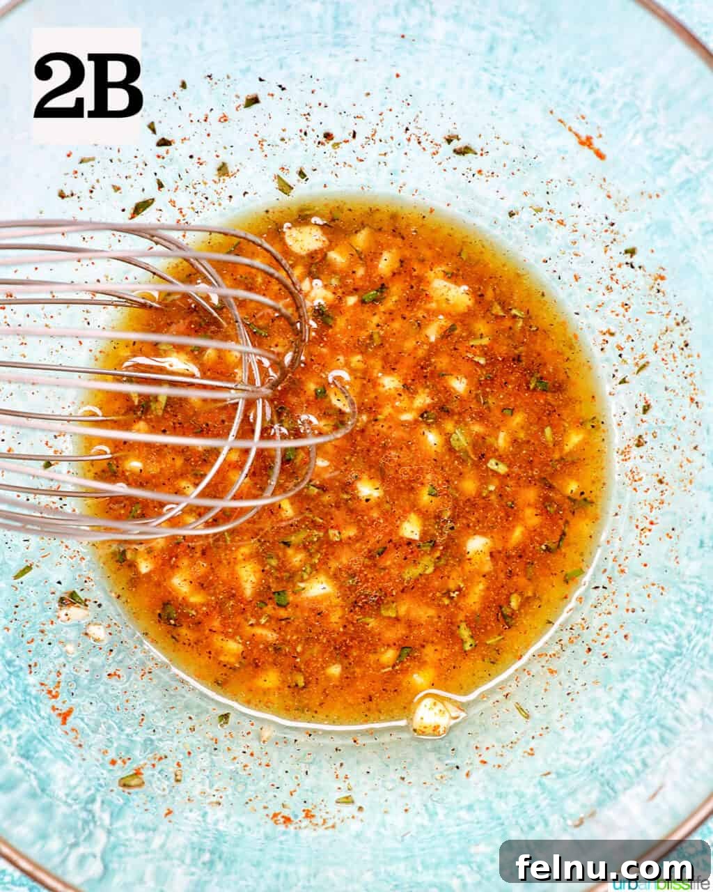 Tek Tepside Tavuklu Patates 7 bowl and whisk with spices.