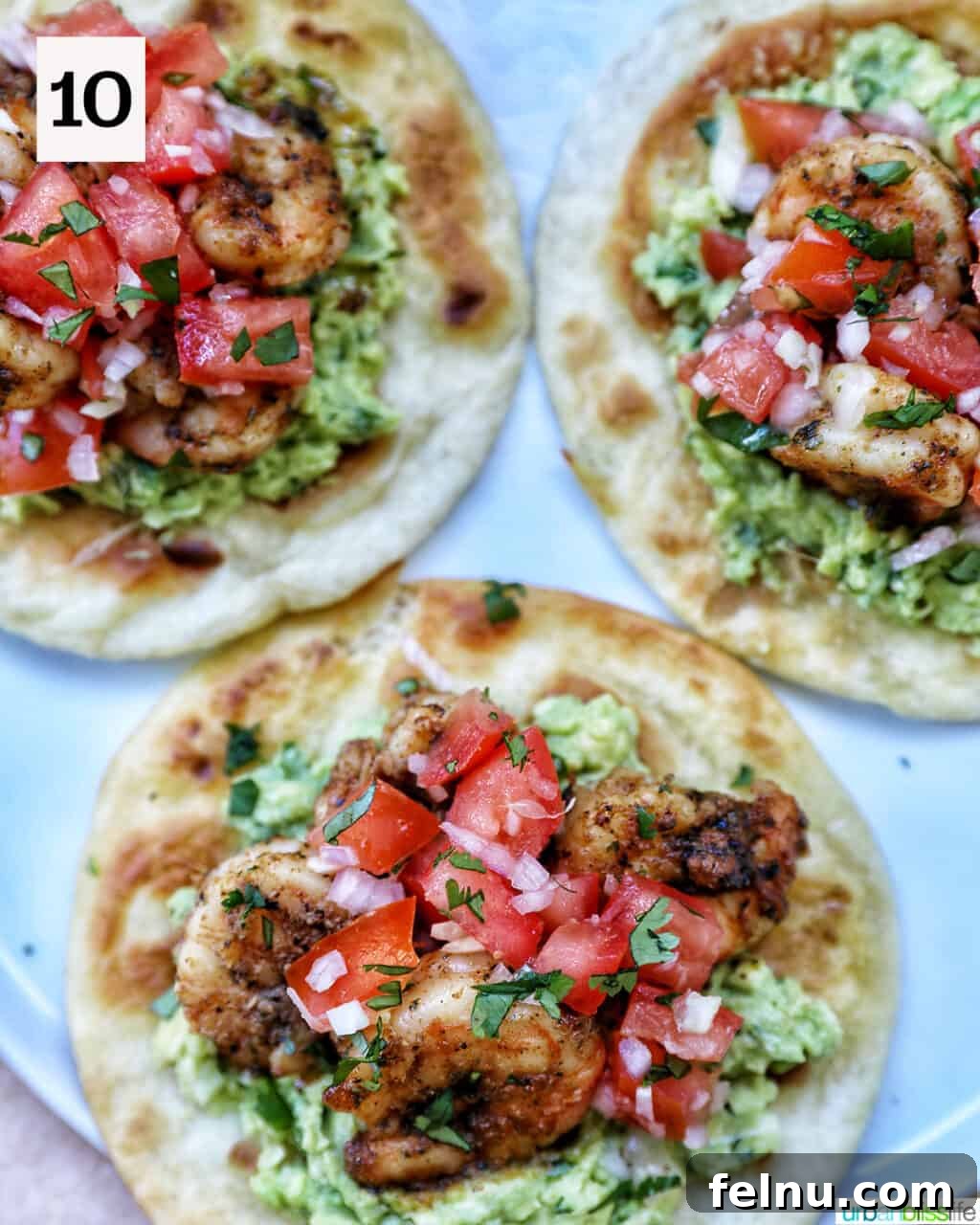 Finished shrimp tostadas with pico de gallo.