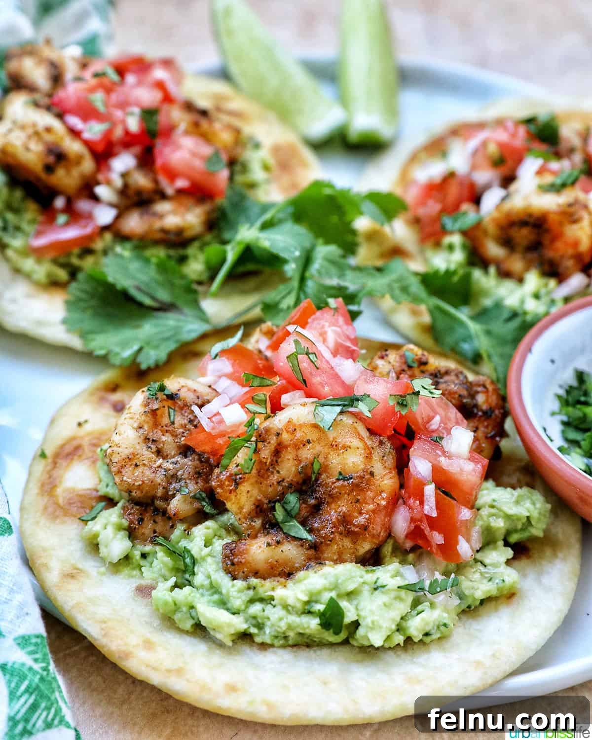 Shrimp tostadas on a plate.