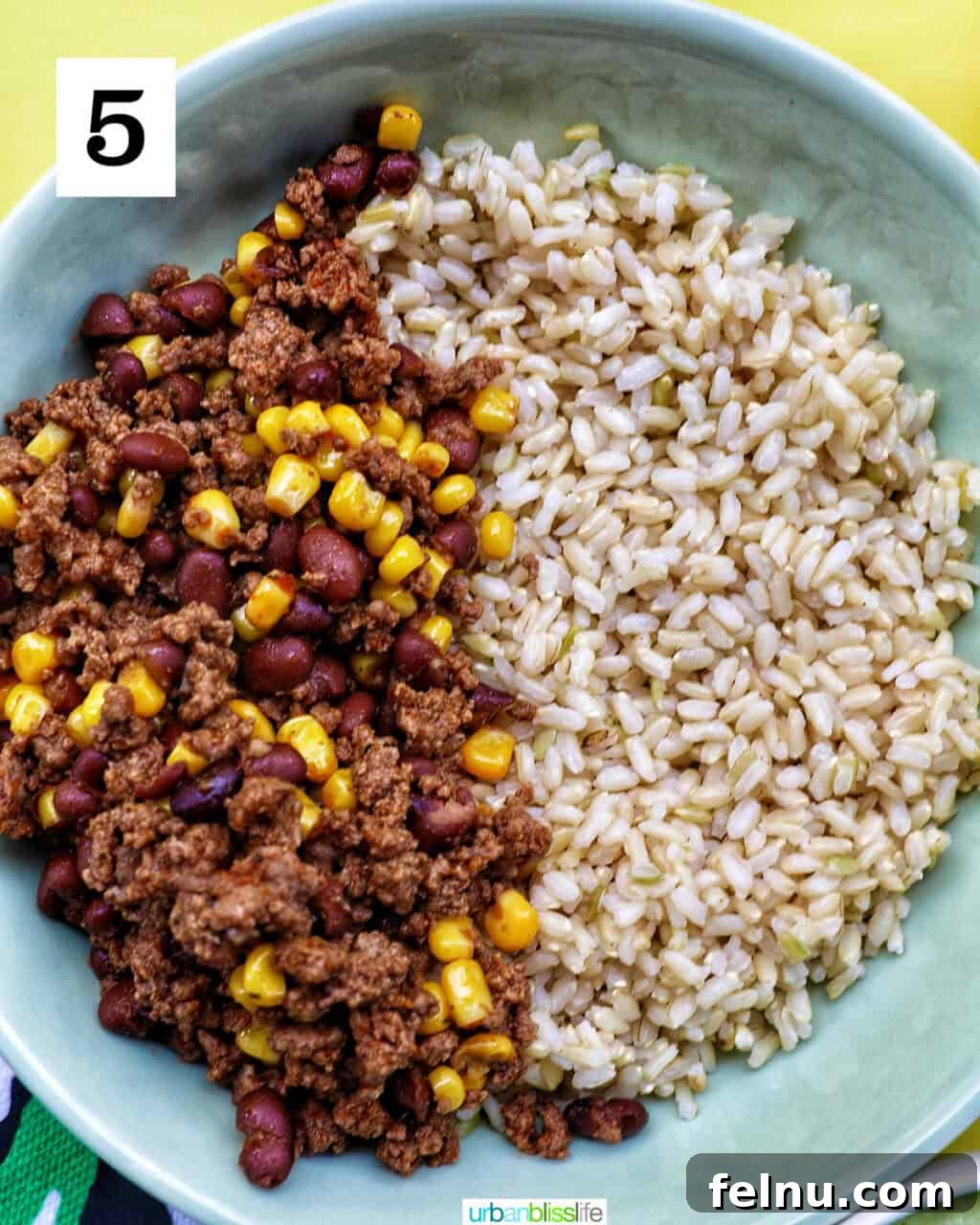 Effortless Fiesta Bowls 10 Bowl of brown rice and beef, beans, corn.