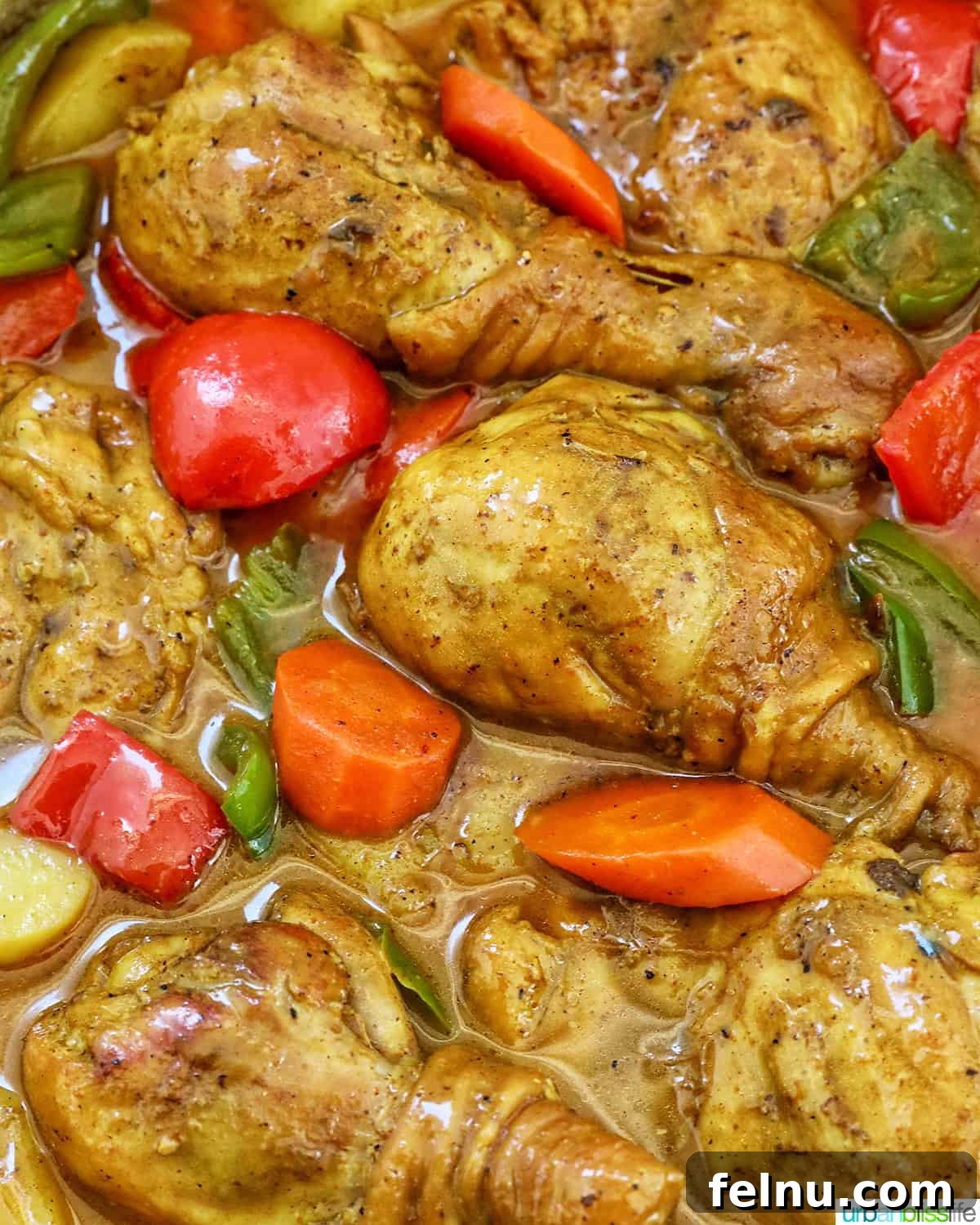 Filipino Chicken Curry
Authentic Chicken Adobo Curry Fusion 18 Filipino Chicken Curry with vegetables in a large pan.