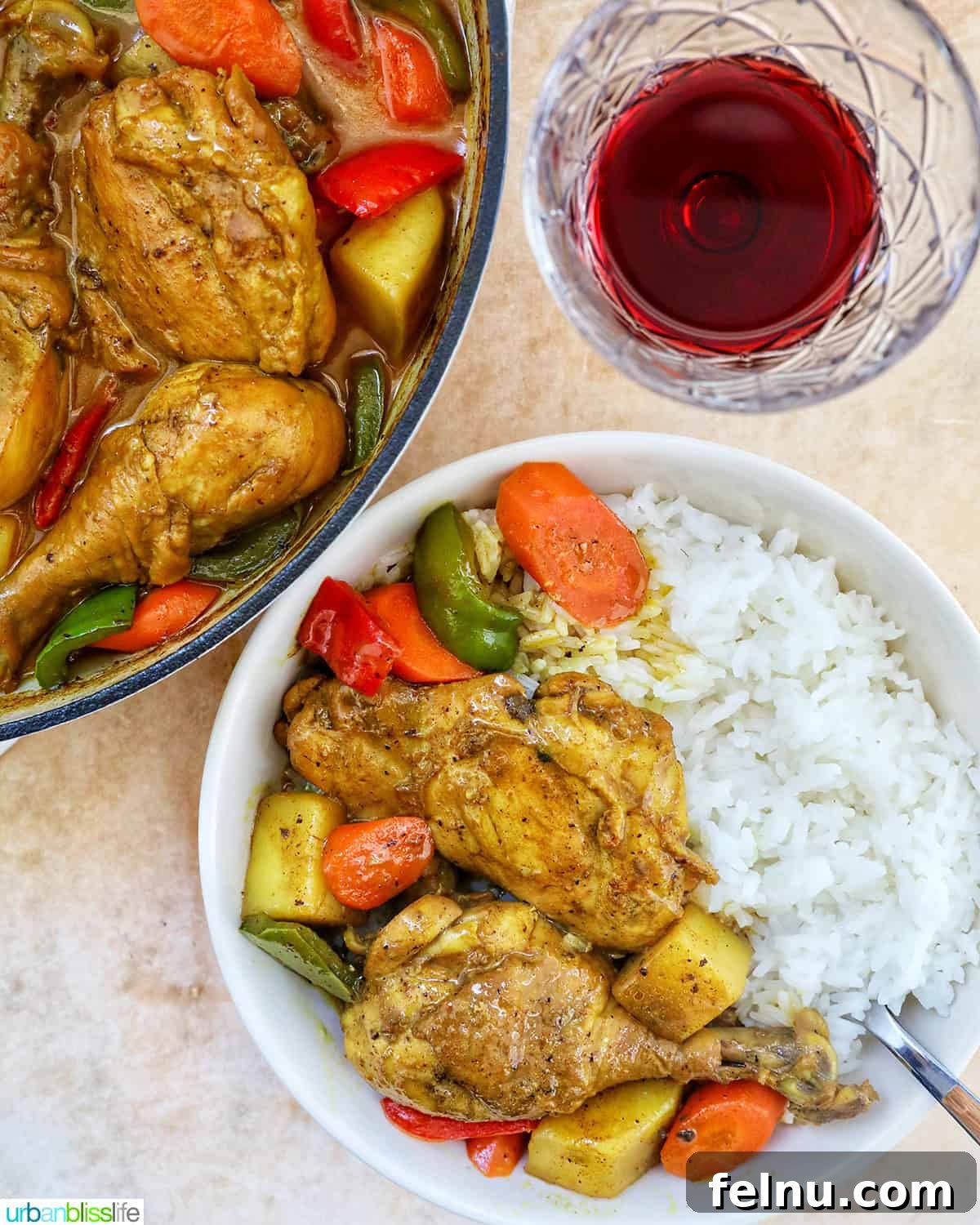 Filipino Chicken Curry
Authentic Chicken Adobo Curry Fusion 20 Filipino Chicken Curry with vegetables and white rice and glass of red wine.