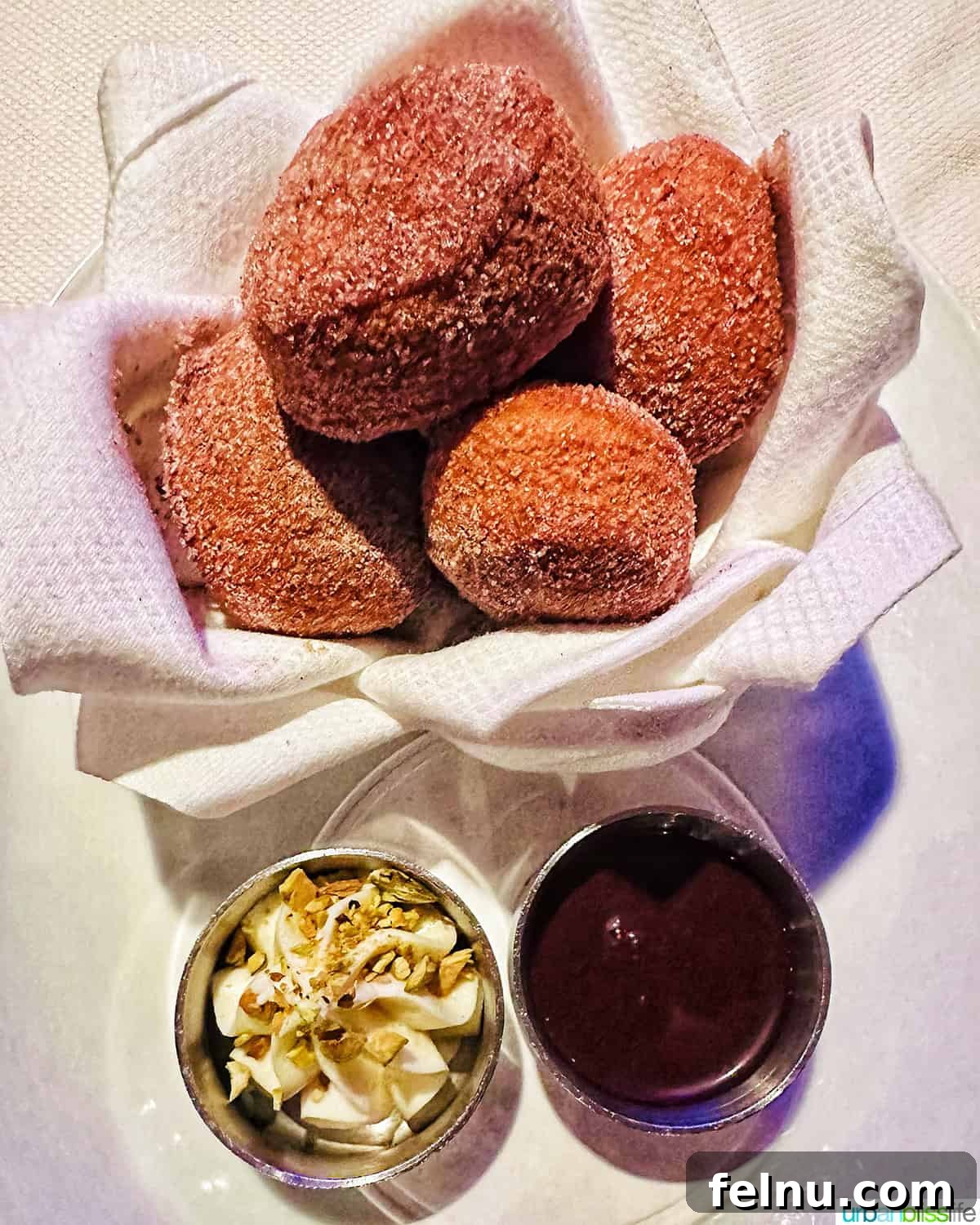 Bowl of donuts and dipping sauces at Marea restaurant New York City (NYC).