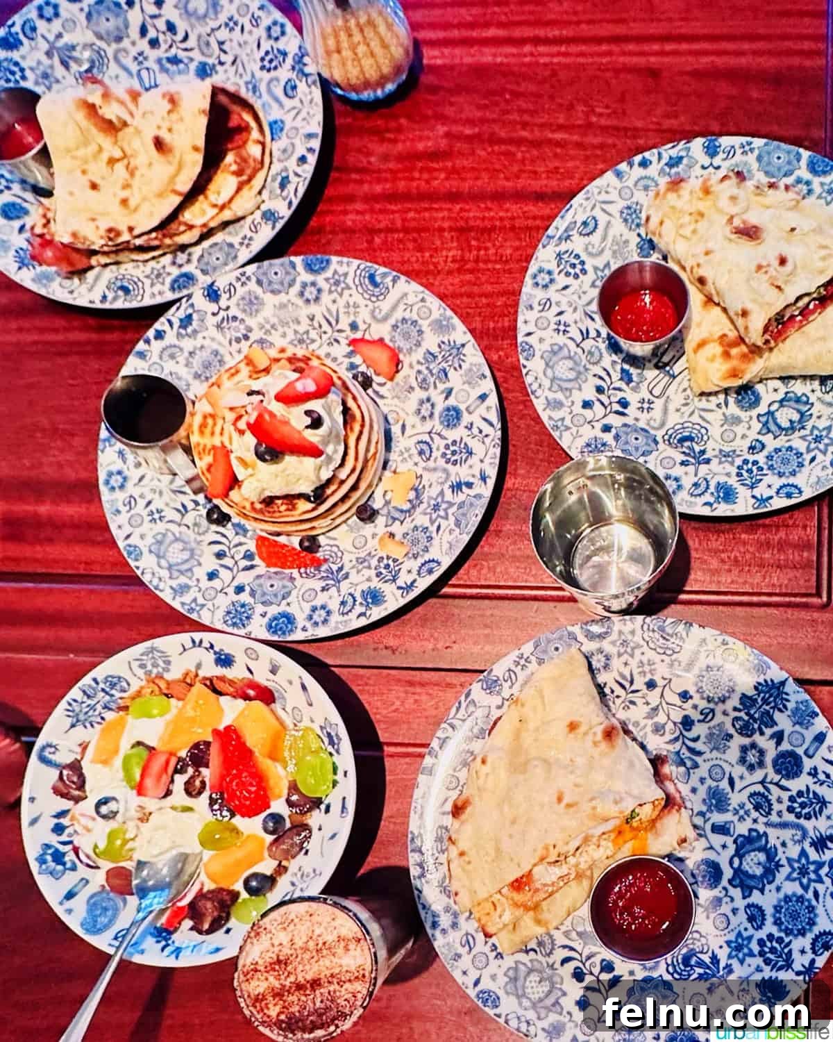 A Covent Garden Breakfast: A Dishoom Delight 2 Plates of delicious breakfast food at Dishoom restaurant in Covent Garden, London.