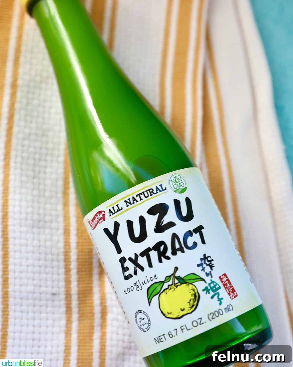 Zesty Yuzu Margarita 3 A bottle of high-quality yuzu juice extract, ready to be used in cocktails and culinary creations.