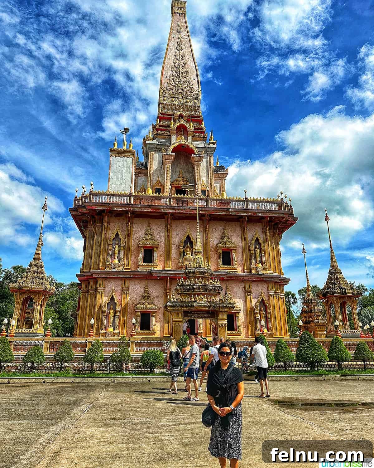 Must-Try Thai Dishes 3 Marlynn in front of Wat Chalong temple in Phuket Thailand.