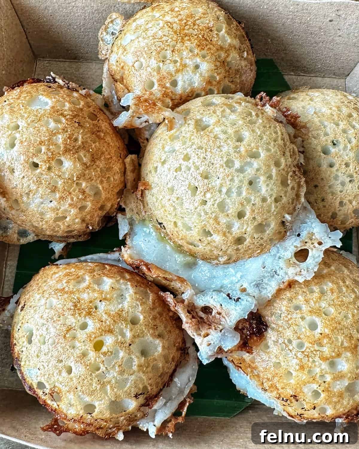 Must-Try Thai Dishes 10 Serving of Kanom Krok street food that I enjoyed in Bangkok, Thailand.