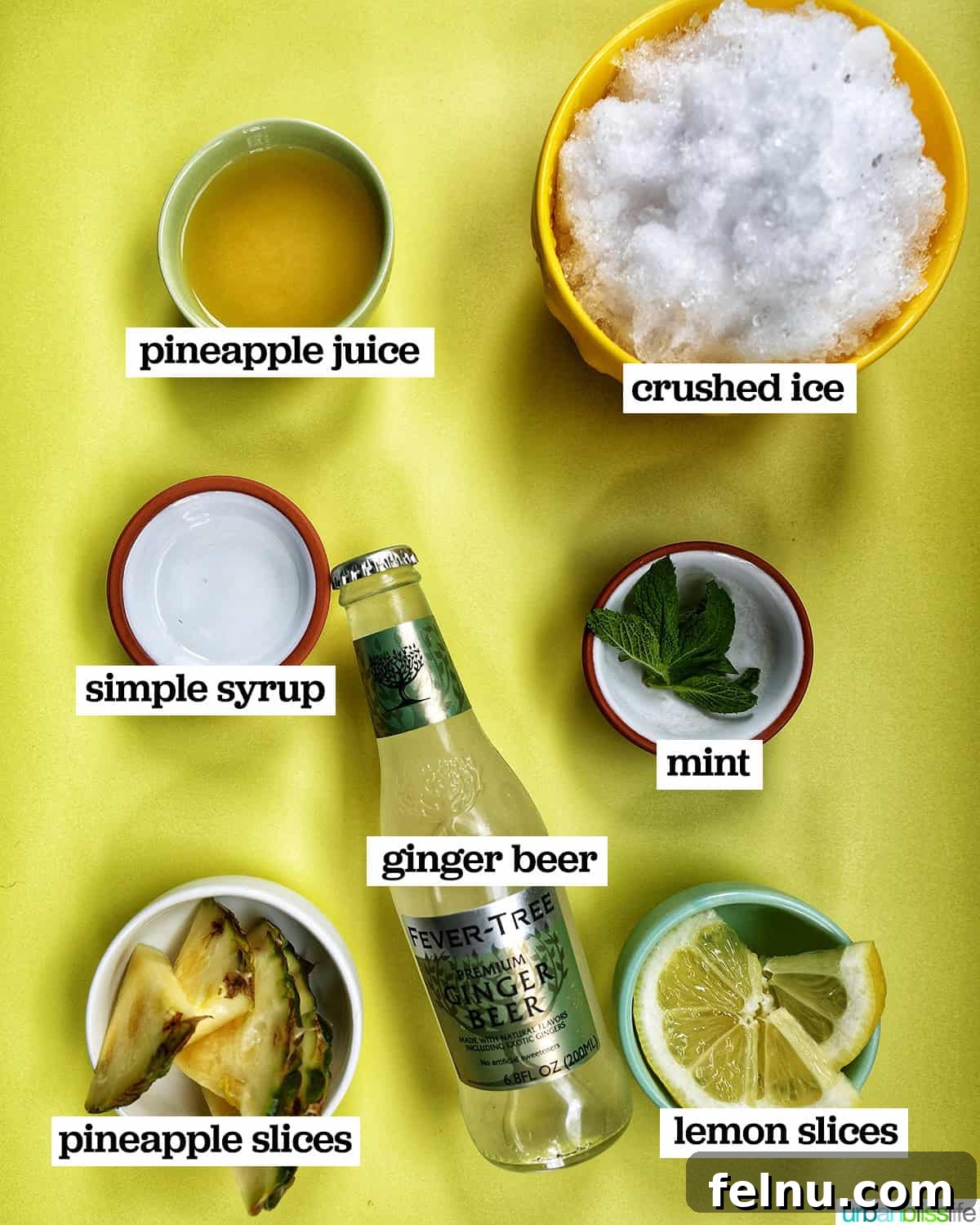 Bowls containing the ingredients for making a Pineapple Mocktail.