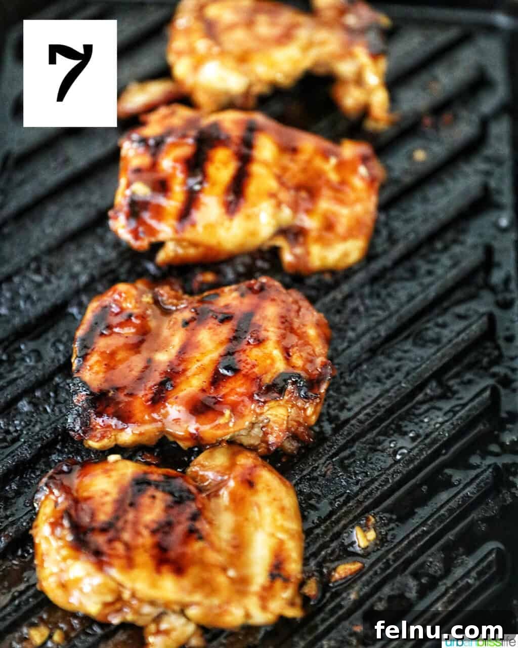 Hawaiian Grilled Chicken with Pineapple Glaze 11 Chicken thighs on a grill