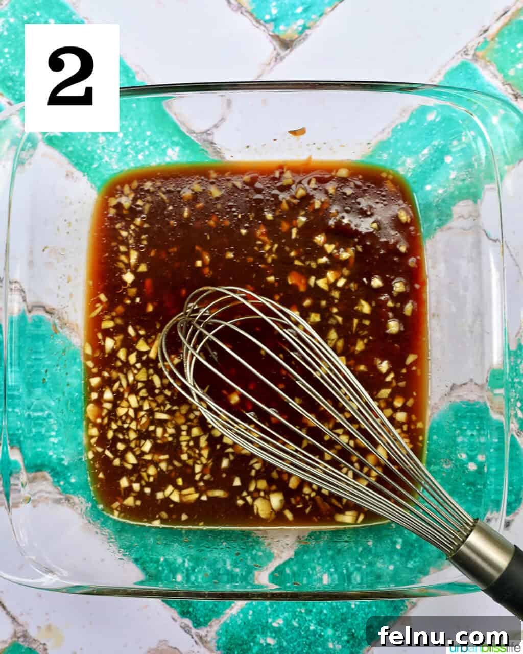 Hawaiian Grilled Chicken with Pineapple Glaze 6 Whisk with BBQ sauce in a dish