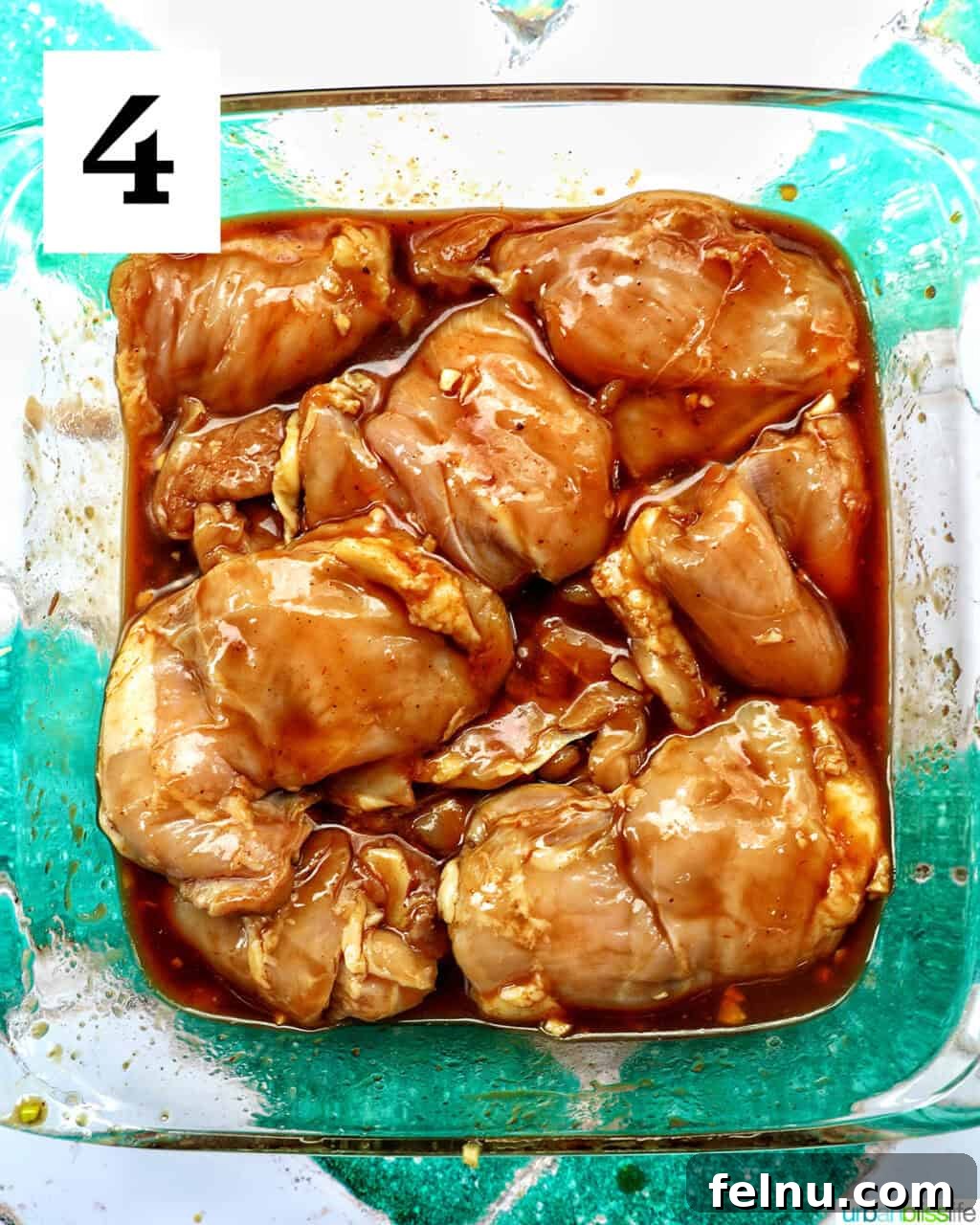 Hawaiian Grilled Chicken with Pineapple Glaze 8 Chicken thighs marinating in BBQ sauce
