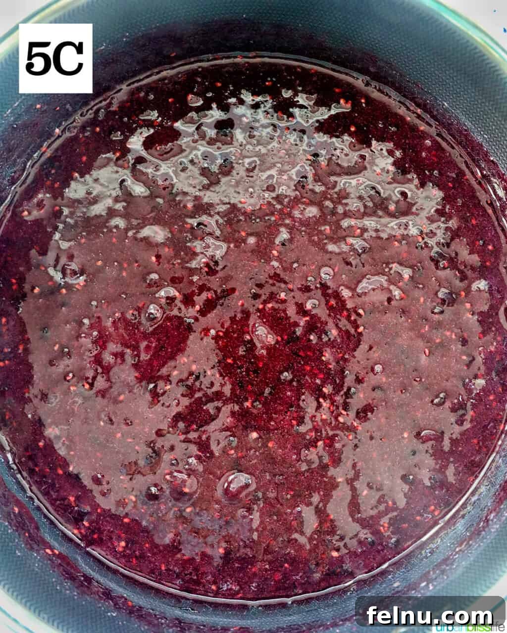 Homemade No-Cook Blackberry Jam 14 blackberry freezer jam in a saucepan.