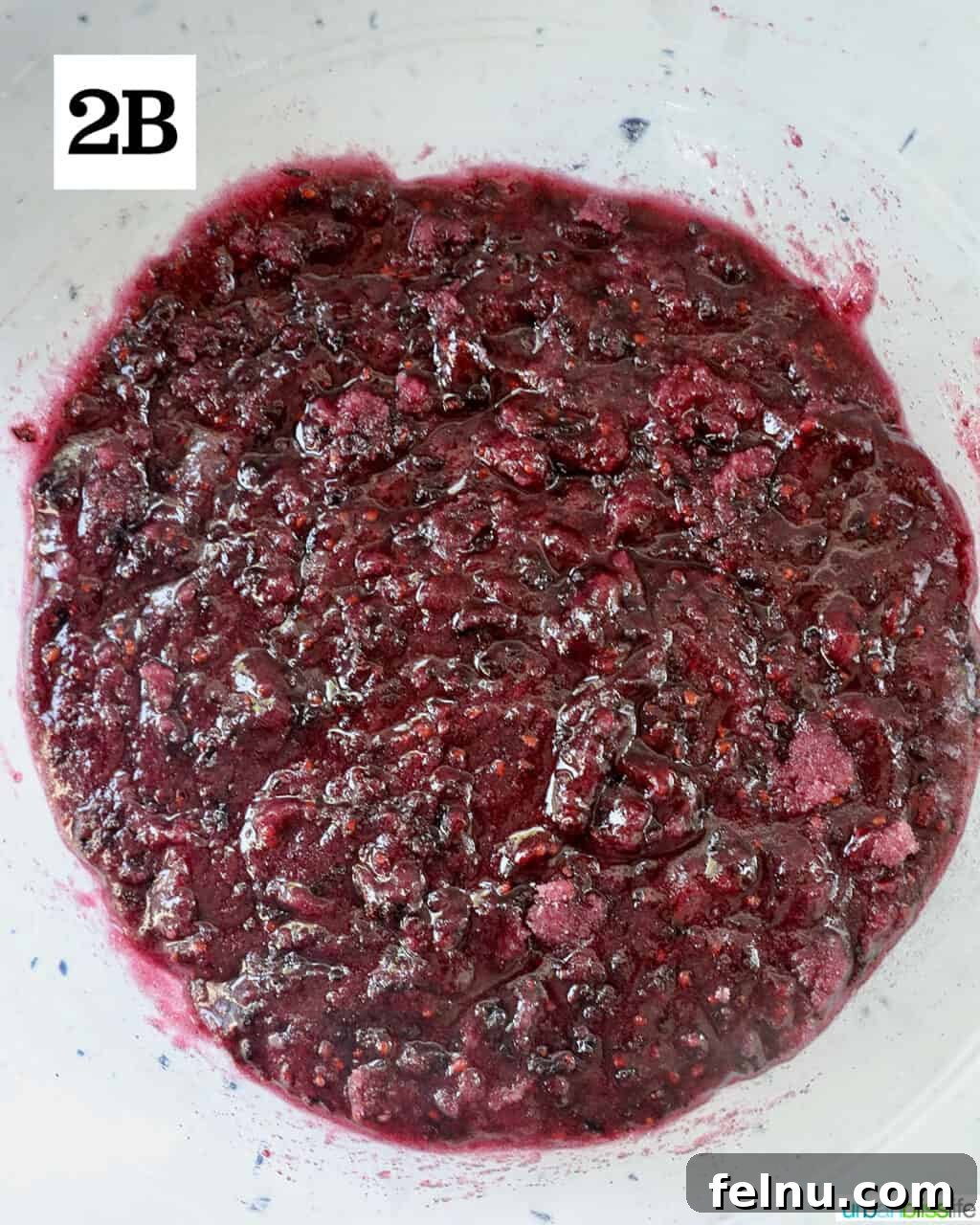 Homemade No-Cook Blackberry Jam 9 blackberry jam in a bowl.