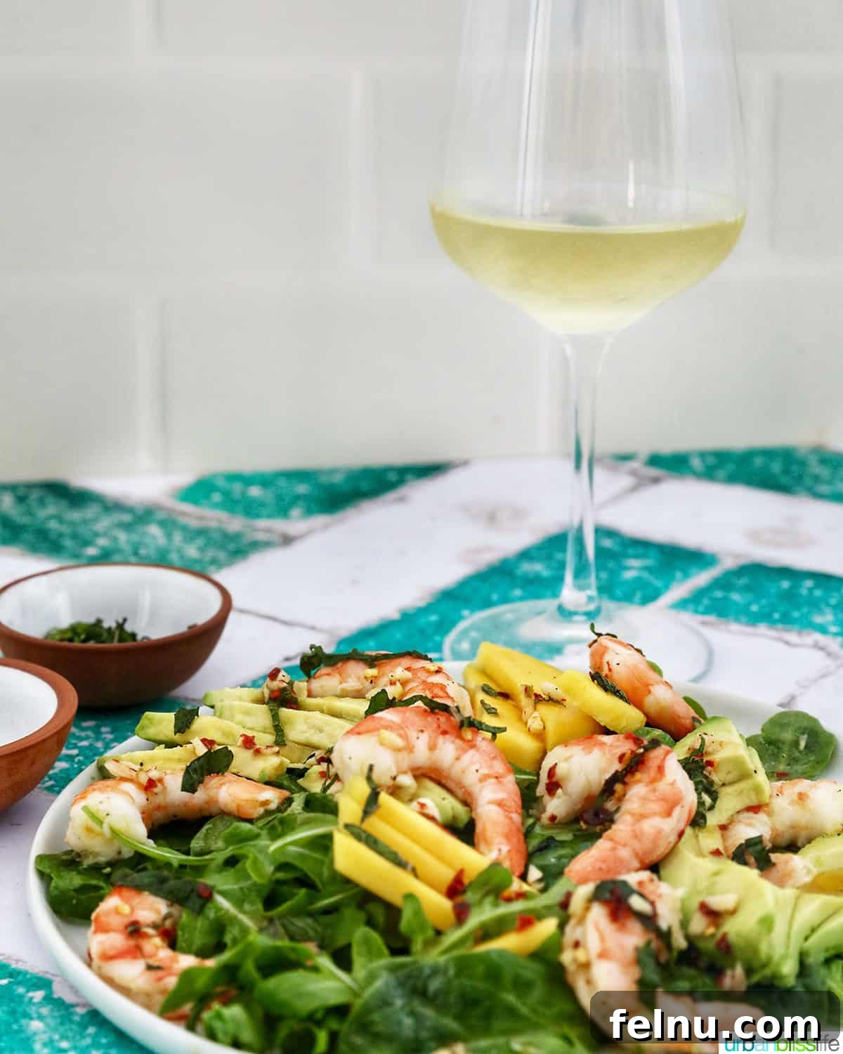 Mango Avocado Shrimp Salad 14 Mango Avocado Prawn Salad paired with a refreshing glass of white wine