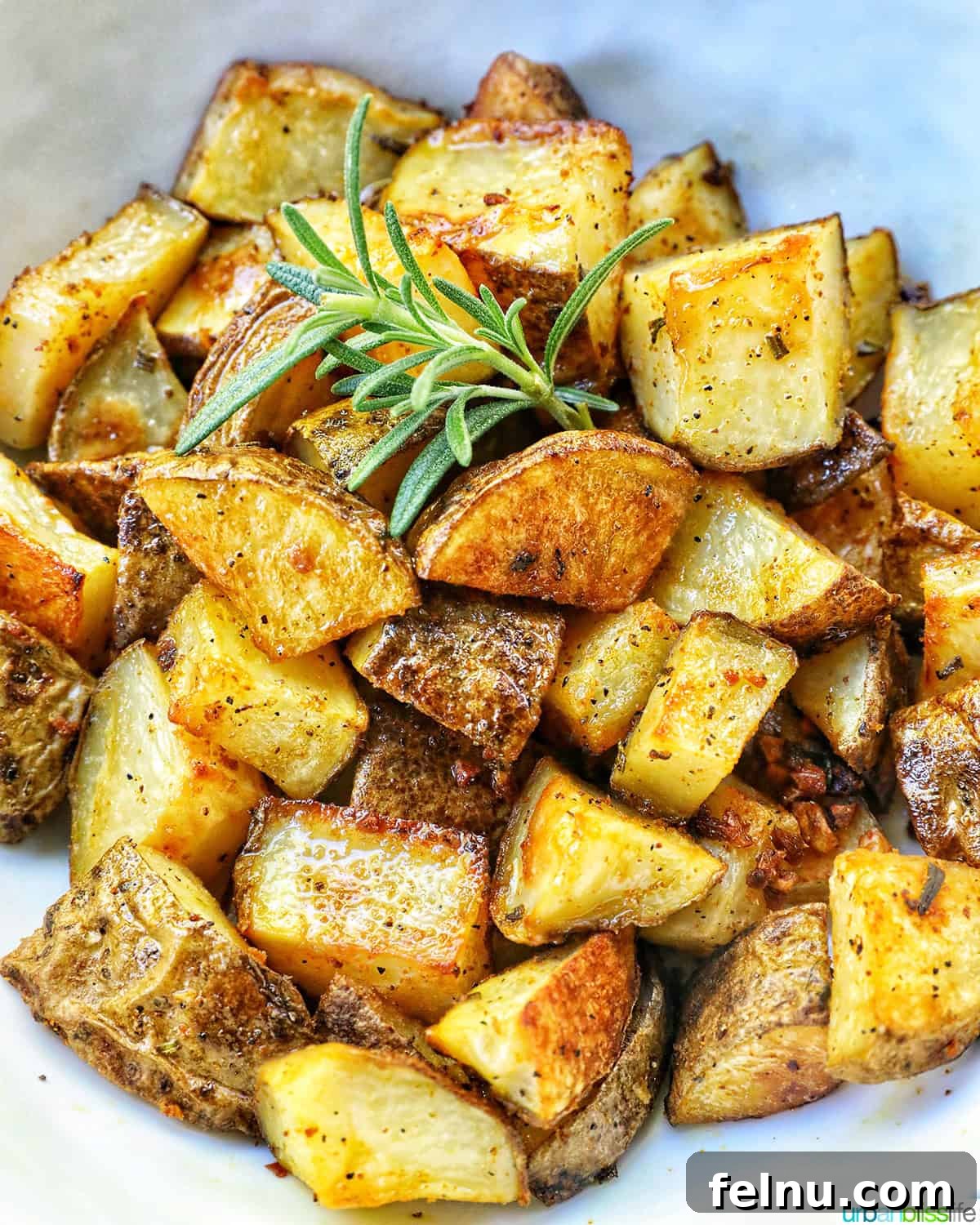Crispy Rosemary Garlic Potatoes 9 rosemary and garlic roasted potatoes.
