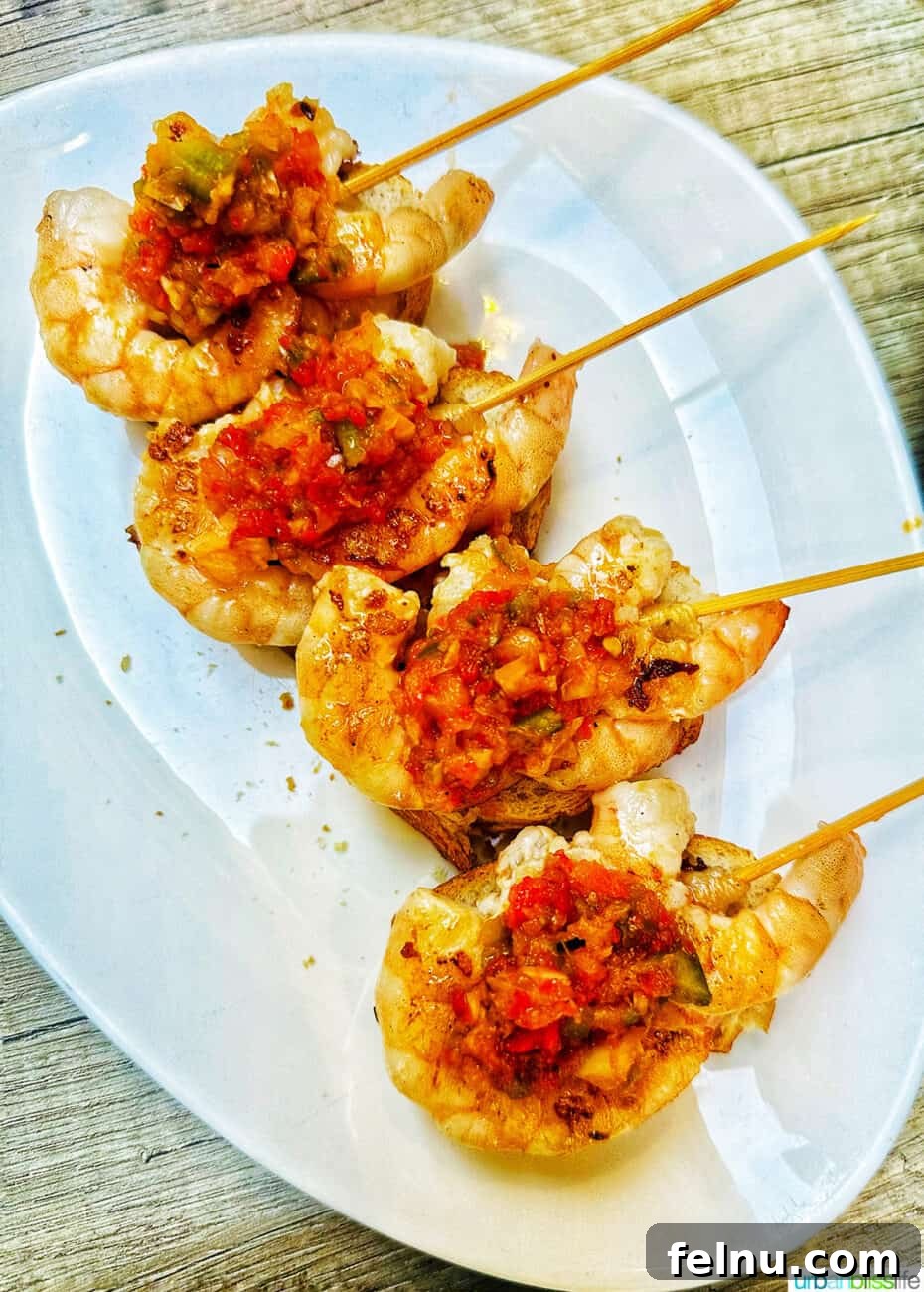 Savoring San Sebastian's Finest Pintxos 13 Fresh prawn skewer pintxo, a popular seafood choice, perfectly cooked and seasoned.