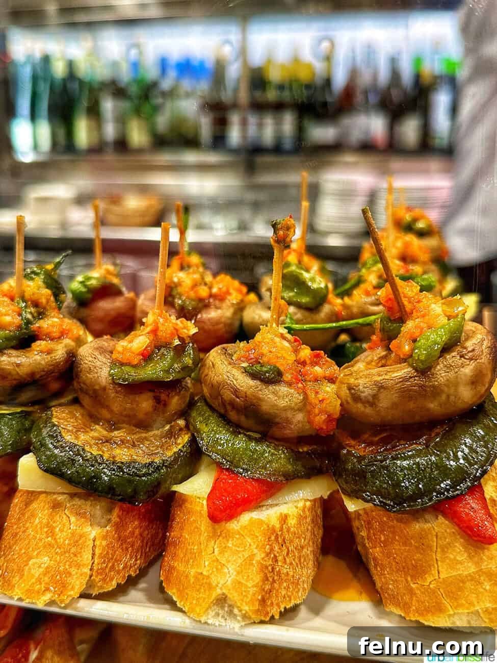 Savoring San Sebastian's Finest Pintxos 5 A selection of delicious pintxos featuring wild mushrooms, a popular ingredient in Basque cuisine.