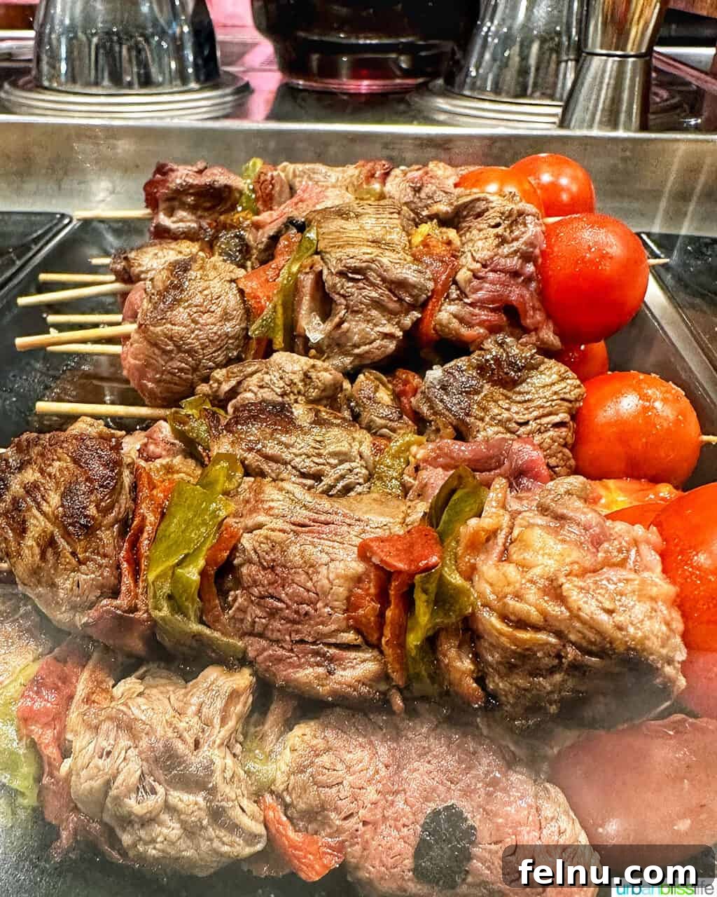 Savoring San Sebastian's Finest Pintxos 7 An assortment of meat pintxos, including succulent beef and rich Iberian ham, a staple in San Sebastian.