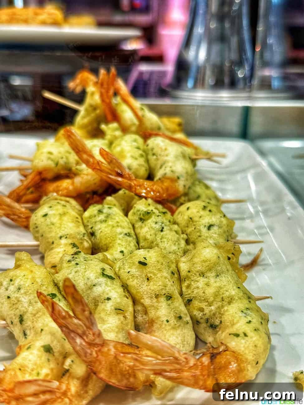 Savoring San Sebastian's Finest Pintxos 10 Perfectly grilled shrimp pintxos, a fresh and delicious seafood option in San Sebastian.