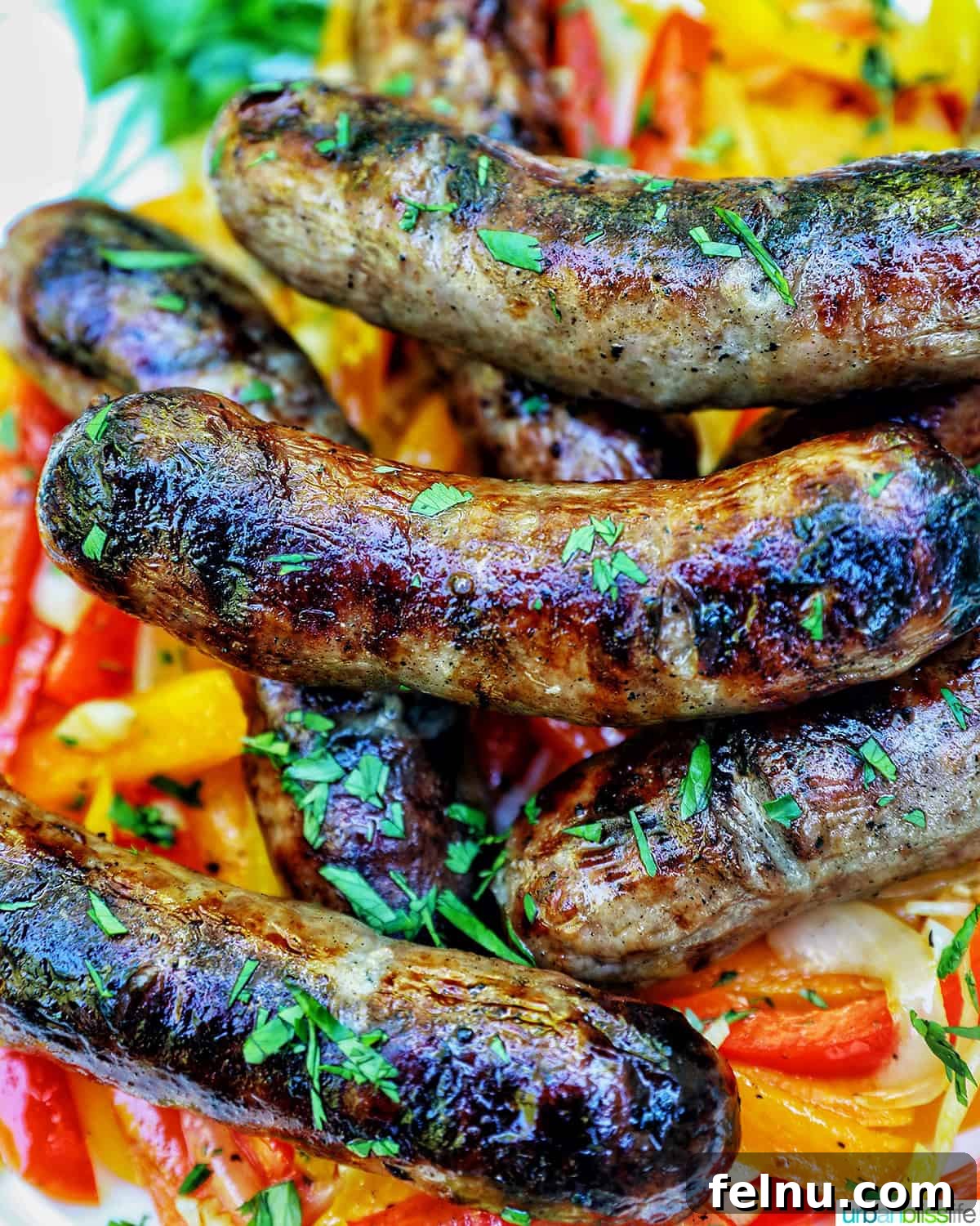 Grilled Bratwurst Bliss 2 Grilled bratwurst over sauteed peppers