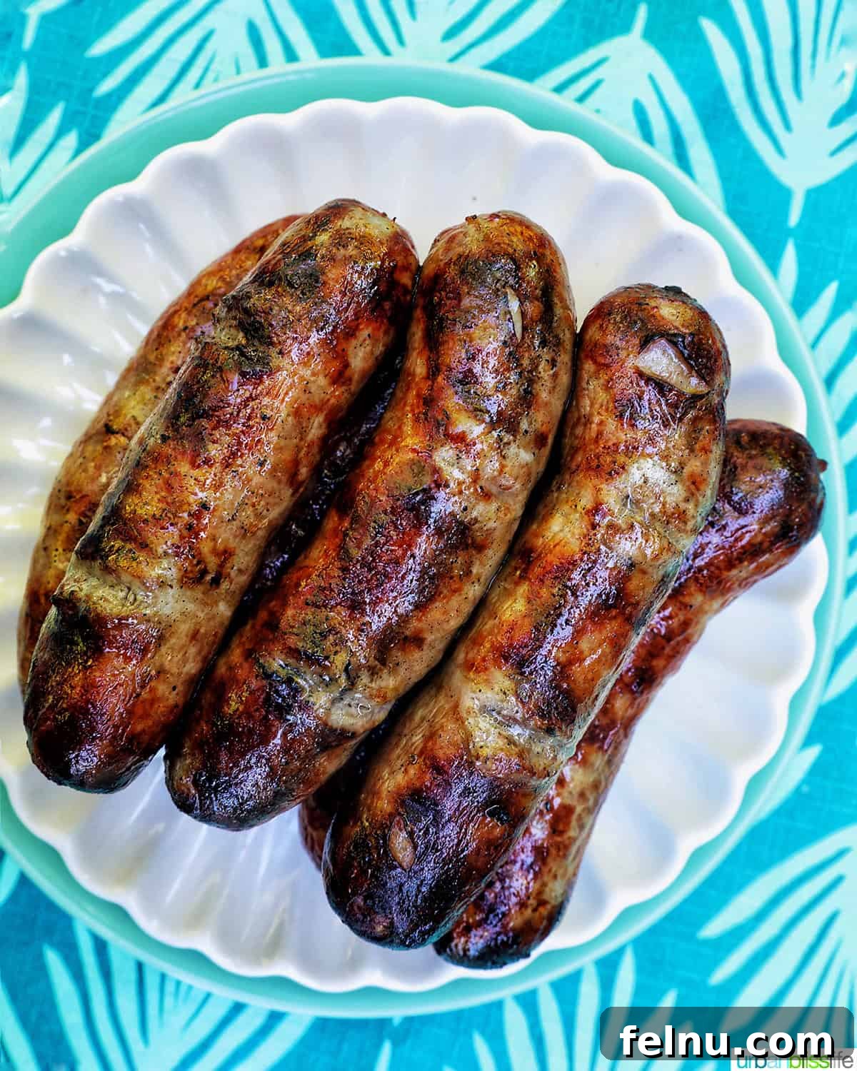 Grilled Bratwurst Bliss 8 Grilled bratwurst on a plate