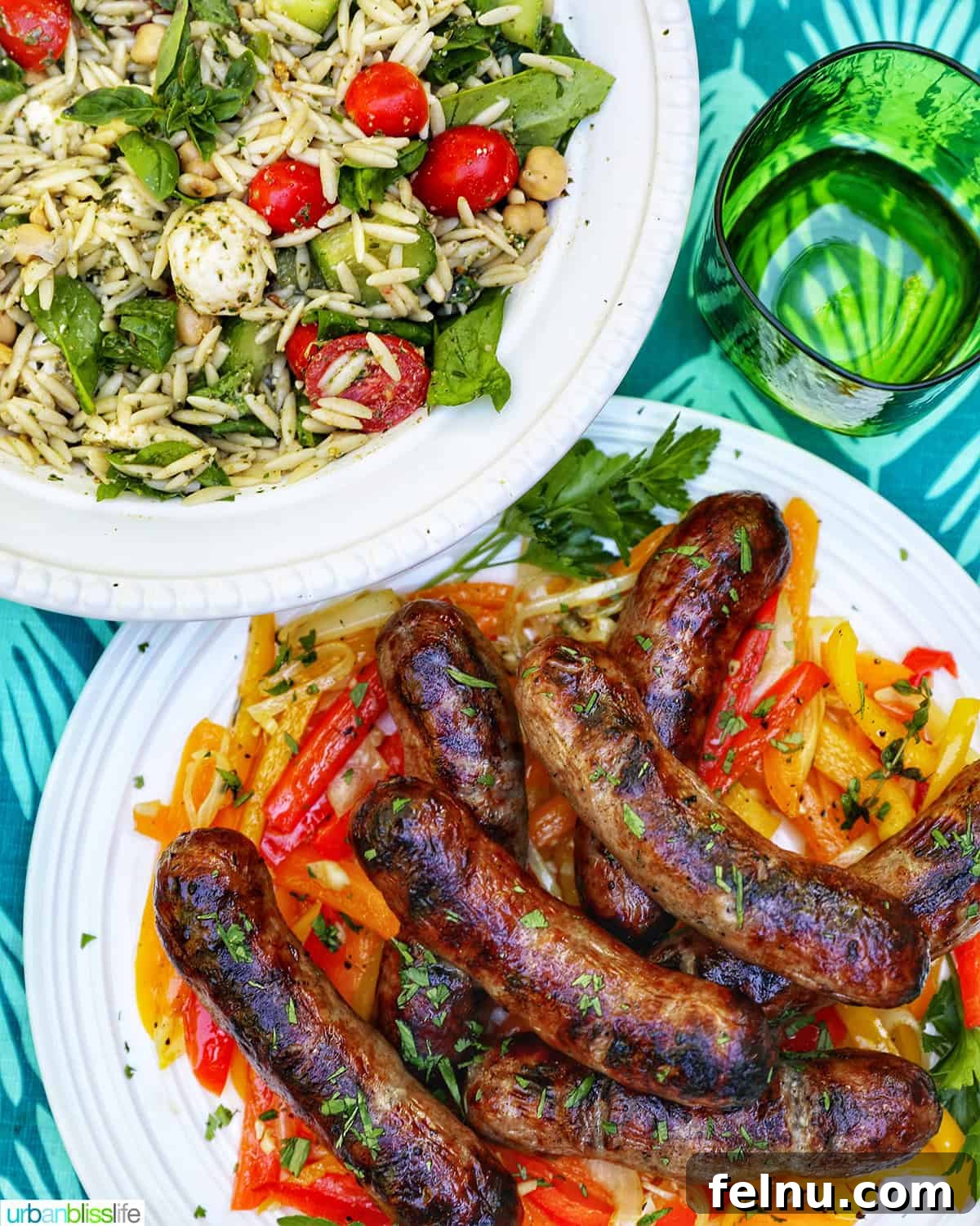 Grilled Bratwurst Bliss 9 Bowl of orzo pesto salad, bowl of grilled bratwurst