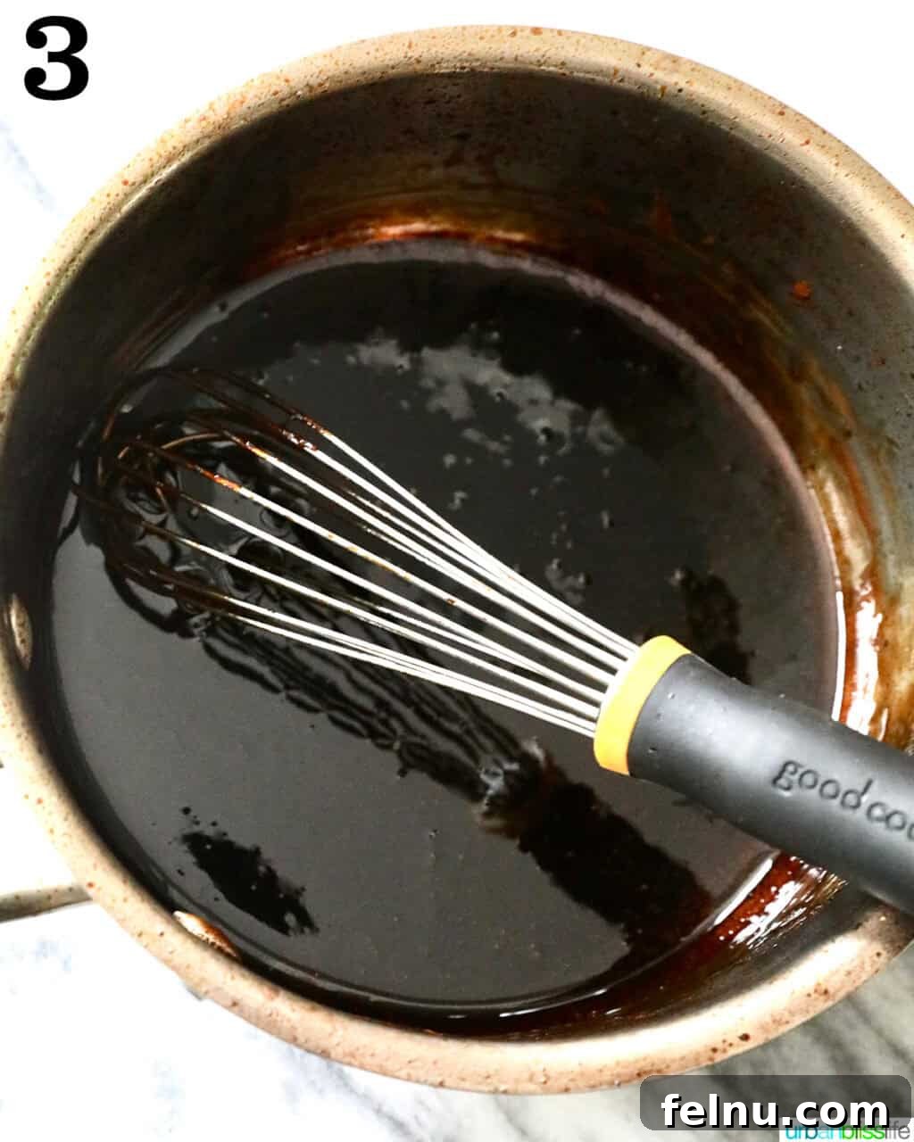 Crafting the Perfect Balsamic Reduction 6 Whisk in a saucepan of balsamic glaze.